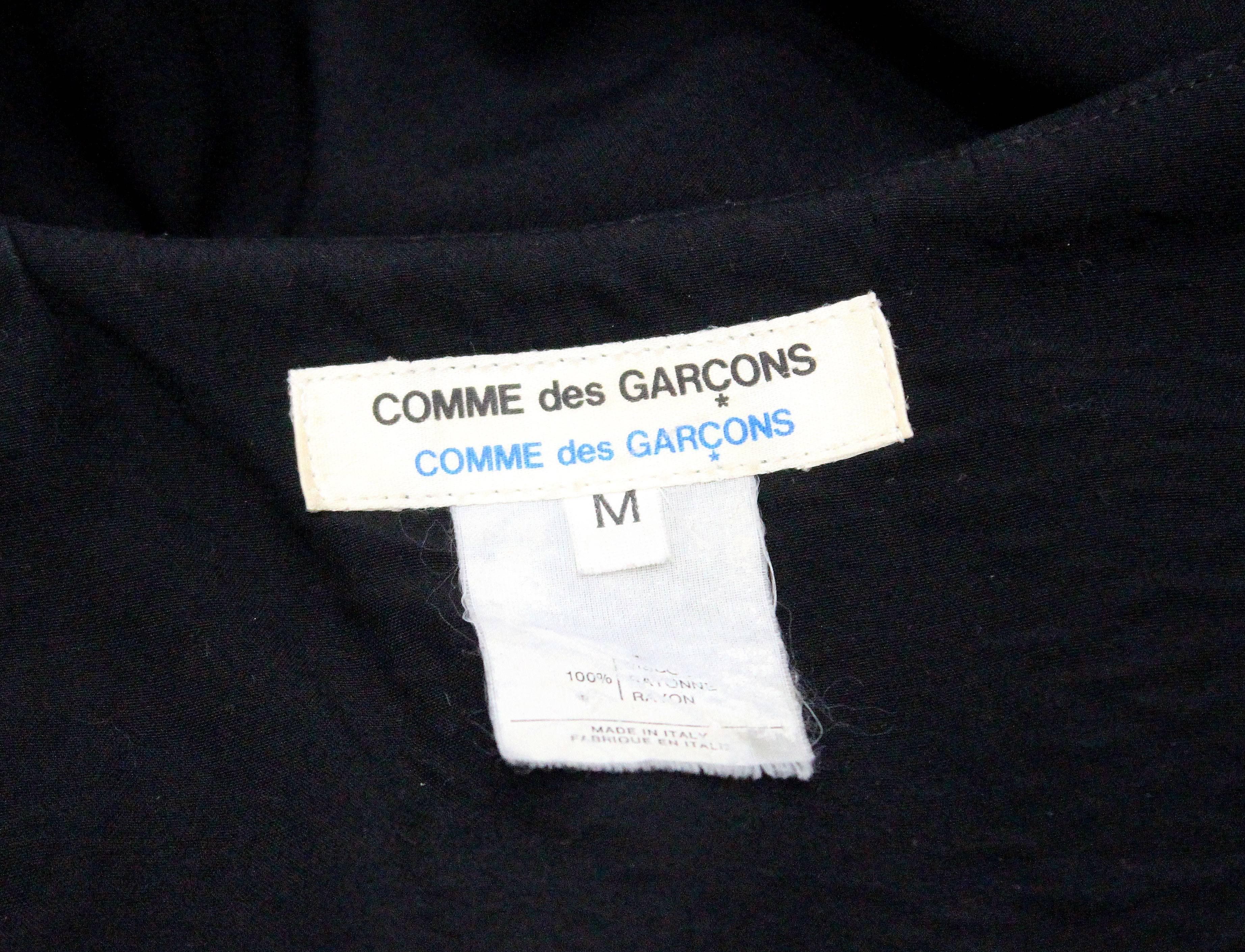 Early Comme des Garcons black asymmetric jumpsuit, c. 1980s 1