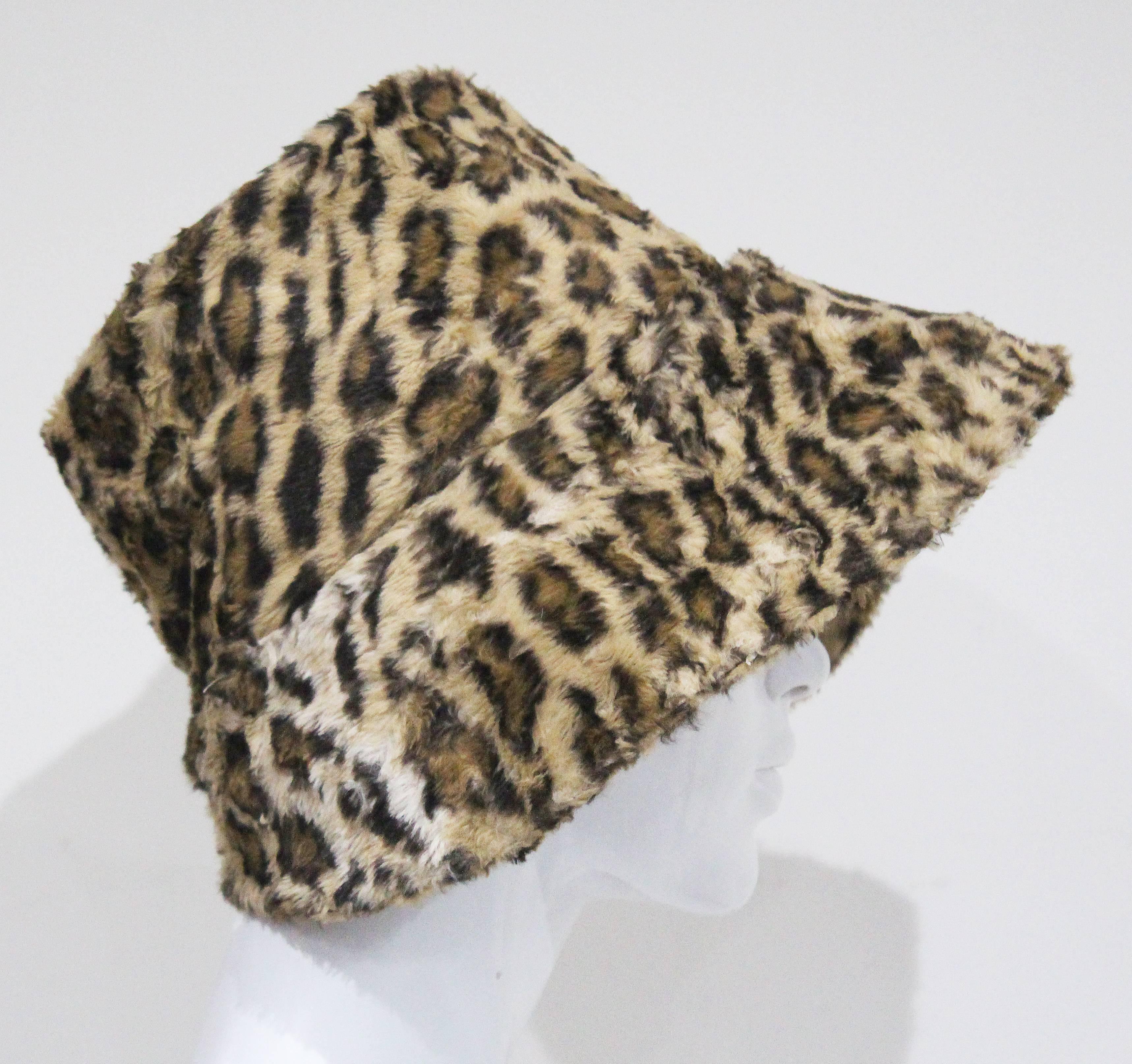 A Norma Kamali faux fur hat in a leopard print made in the 1990s. 

Medium

New with tags