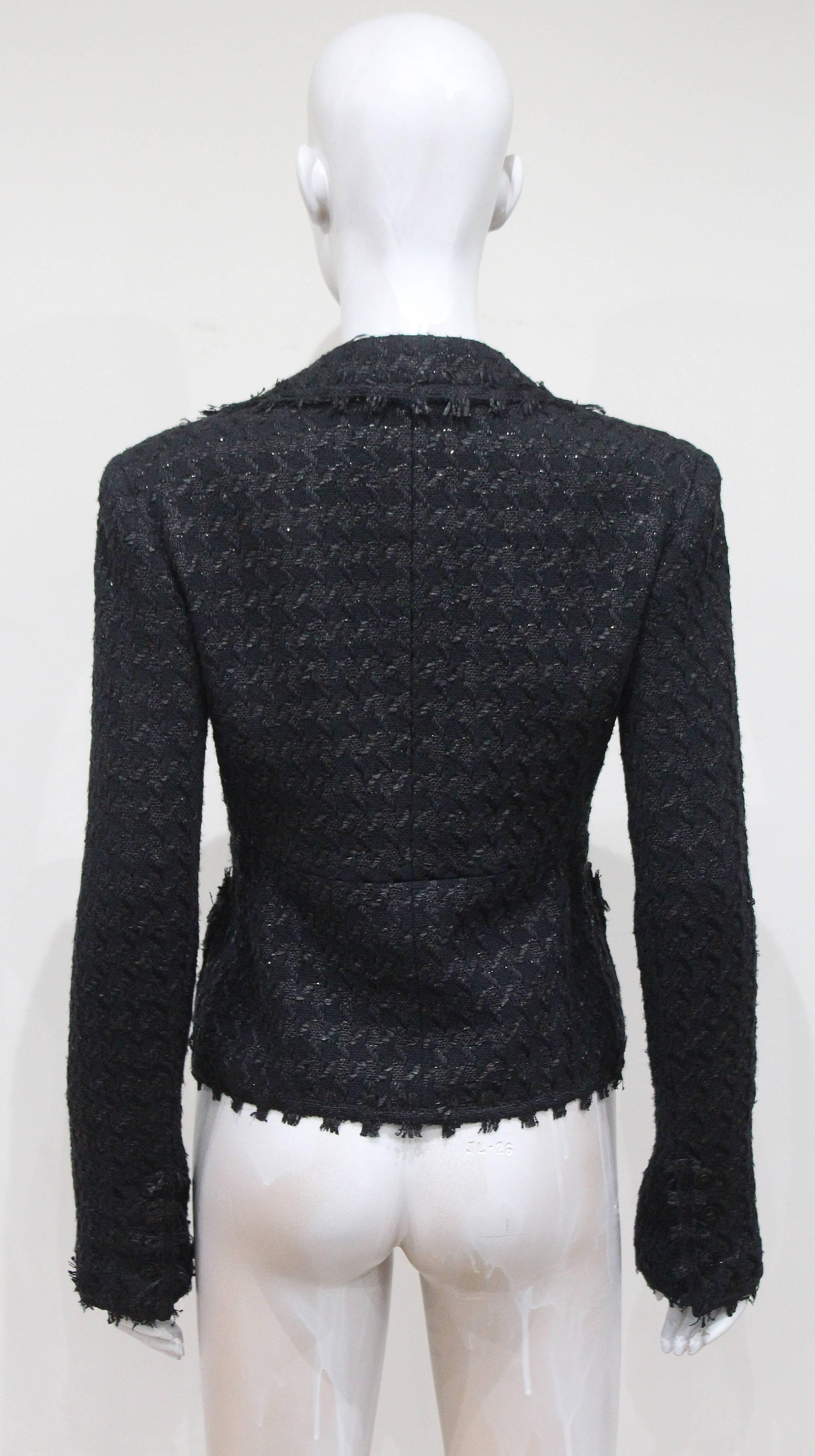 Chanel low plunge fantasy tweed black jacket, c. 2005 In Excellent Condition In London, GB