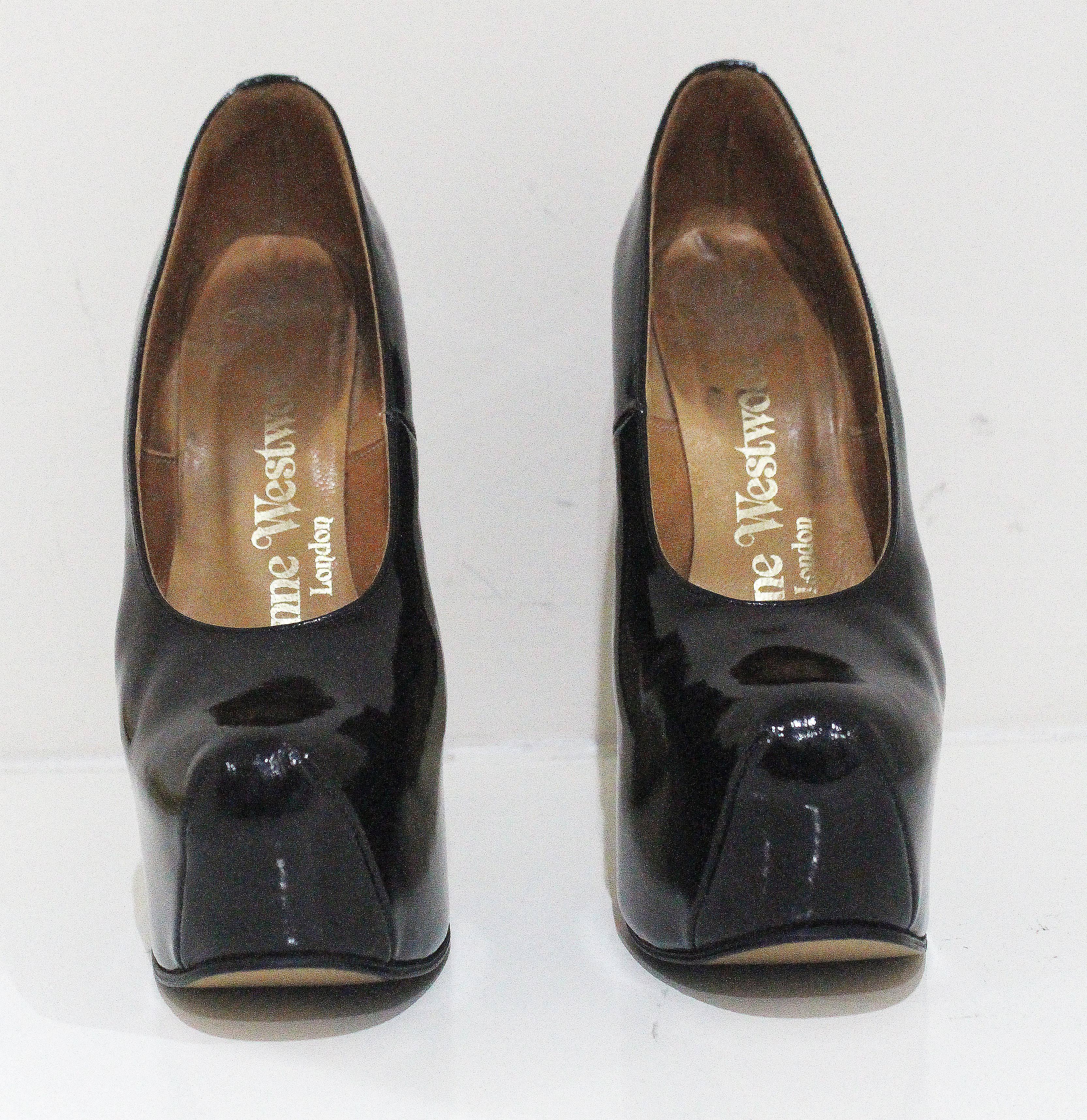 A rare pair of Vivienne Westwood elevated court shoes in black patent leather. Made in the early 1990s. 

Size UK 5 

