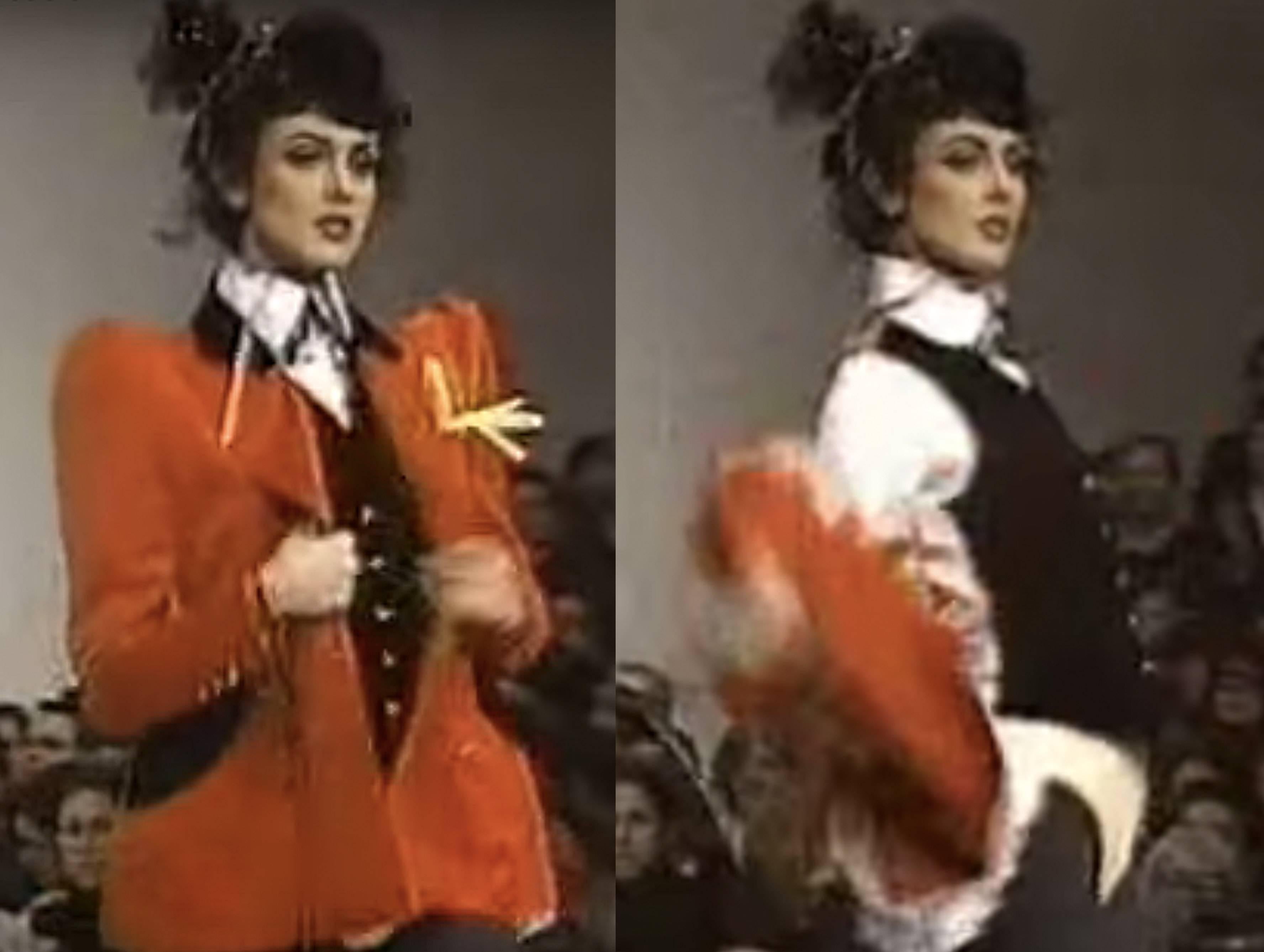 A rare Vivienne Westwood riding suit from the Autumn/Winter 1994 'On Liberty' collection. The suit features a tailored red blazer with puff shoulders, black velvet lapels and pockets, black velvet pants, black velvet waistcoat, white cotton shirt