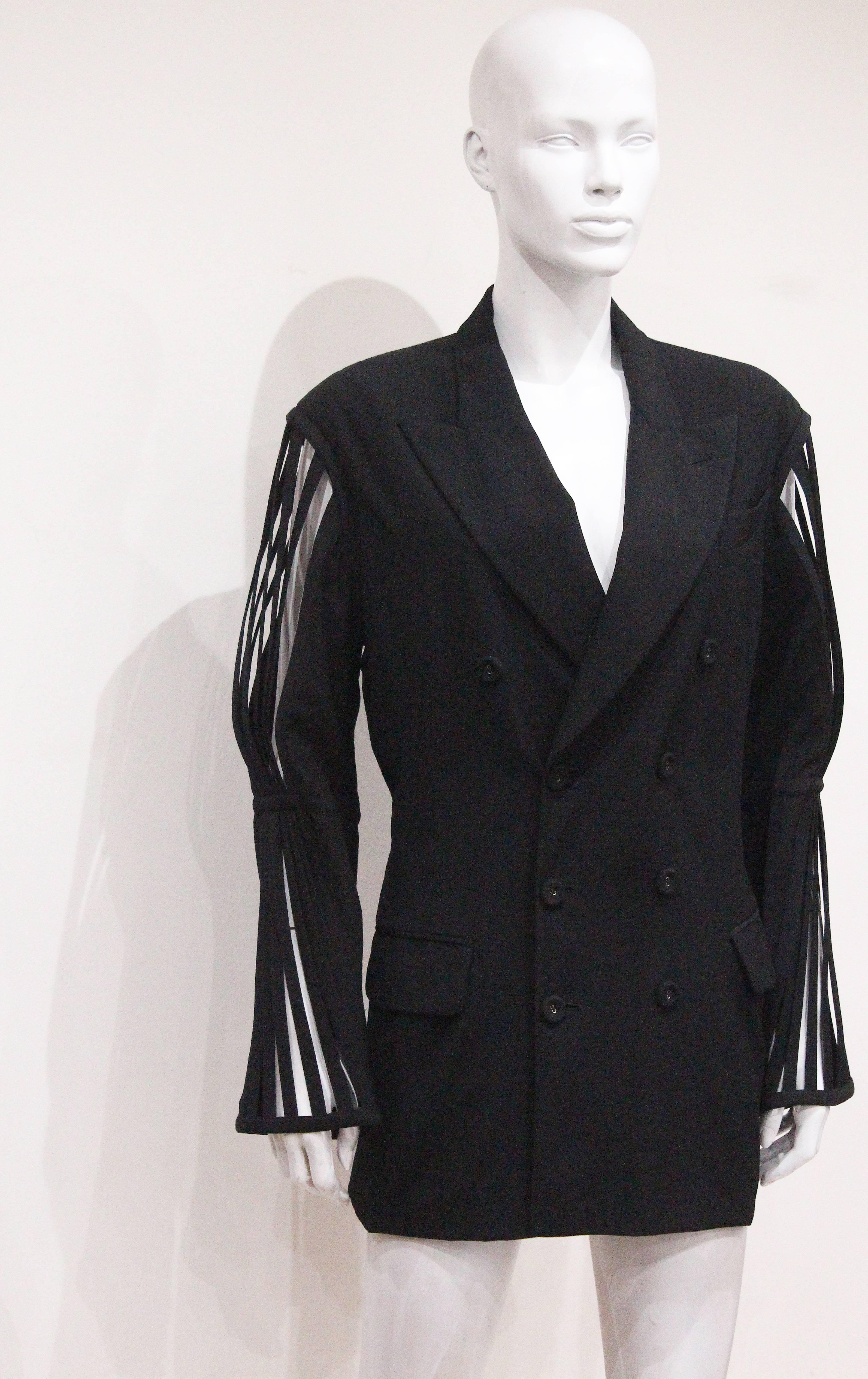 Black Jean Paul Gaultier double breasted blazer jacket with caged sleeves, c. 1989