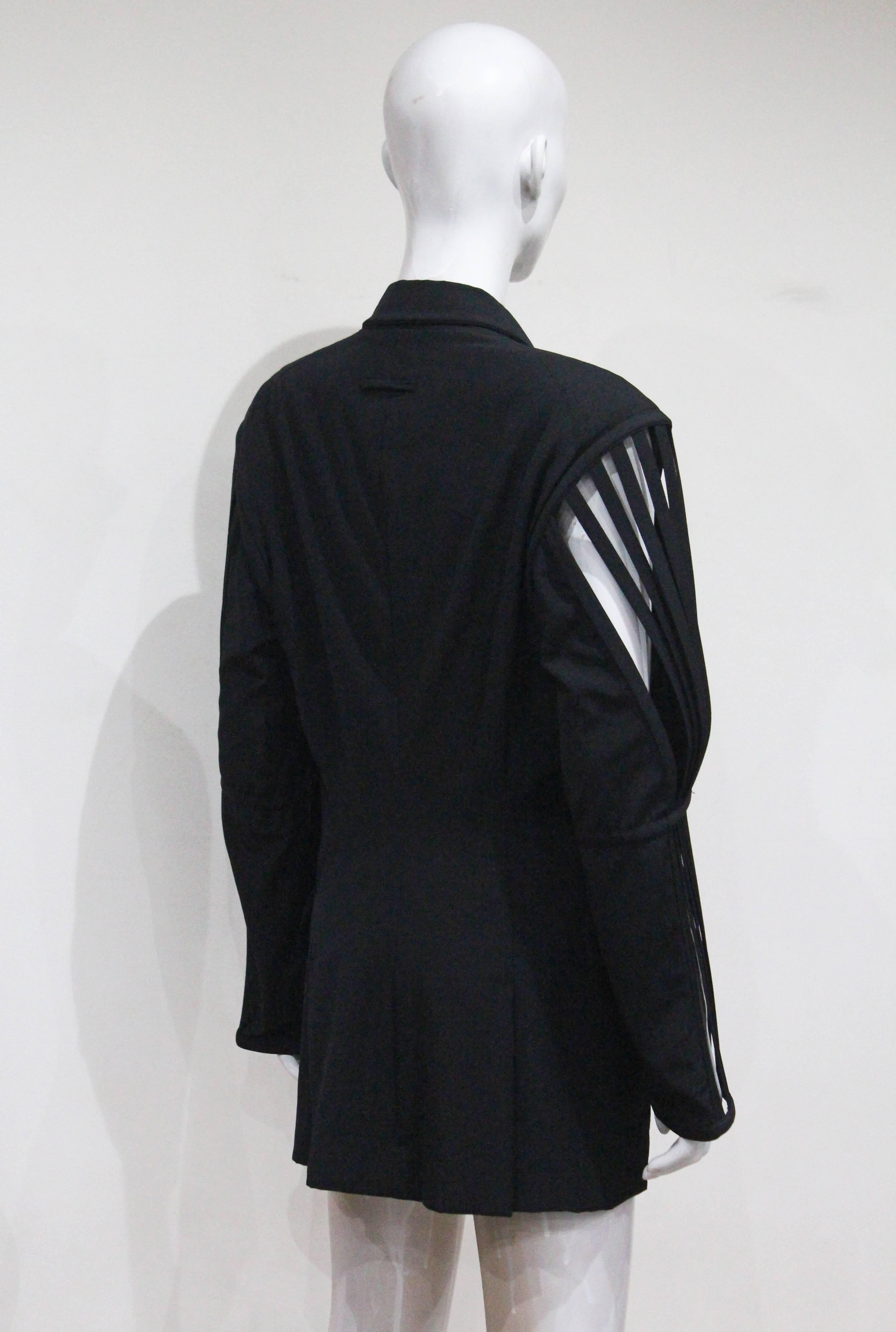 Women's or Men's Jean Paul Gaultier double breasted blazer jacket with caged sleeves, c. 1989