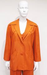 Christian Dior burnt orange raw silk pant suit with cone bra, c. 1950s