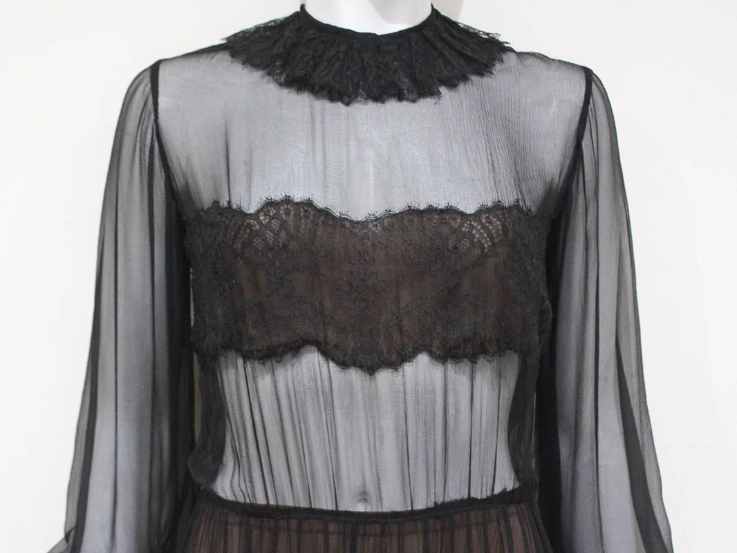 Black Yves Saint Laurent Haute Couture chantilly lace and chiffon evening gown, c.1970