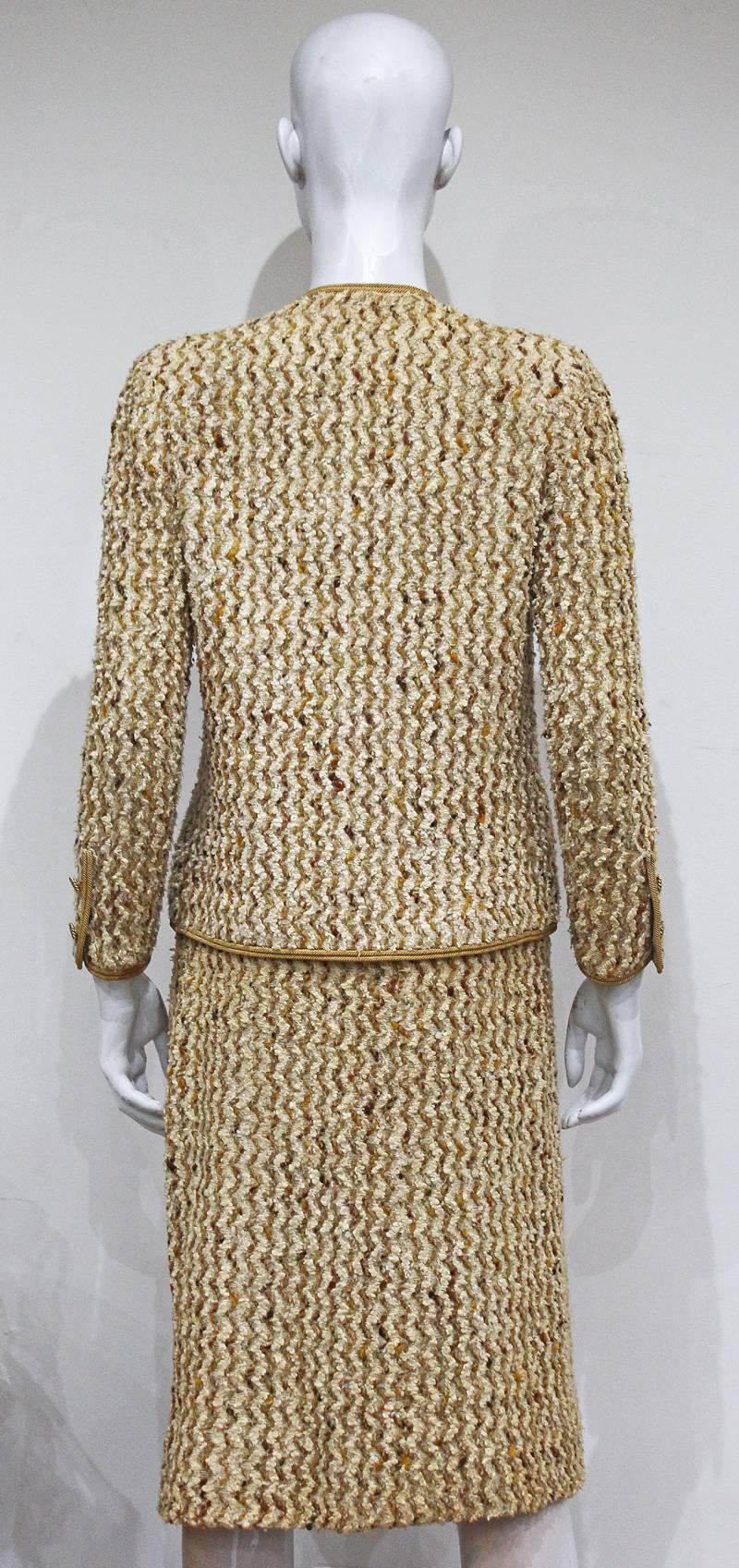 Brown Chanel haute couture bouclé skirt suit, c.1965