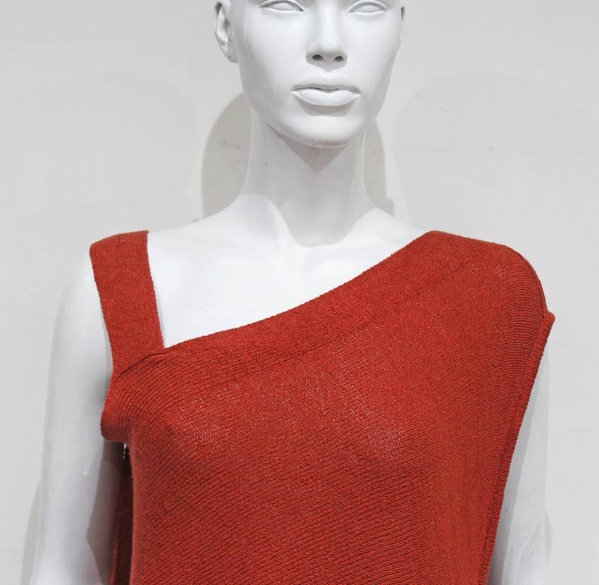 This dress captures the true essence of Issey Miyake's aesthetic during the 70s and 80s. The dress is cut asymmetrically and hangs off the body to one side which creates drapes to the lower hip. 

Size S/M