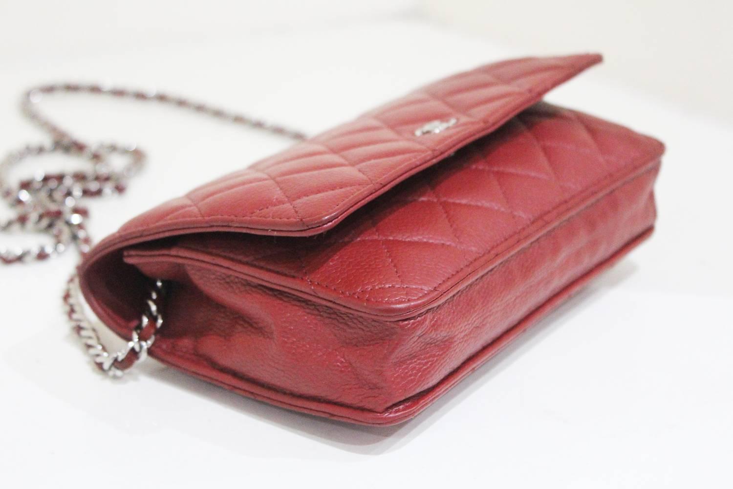 Chanel red caviar quilted cross body wallet-on-chain WOC flap bag  In Excellent Condition In London, GB