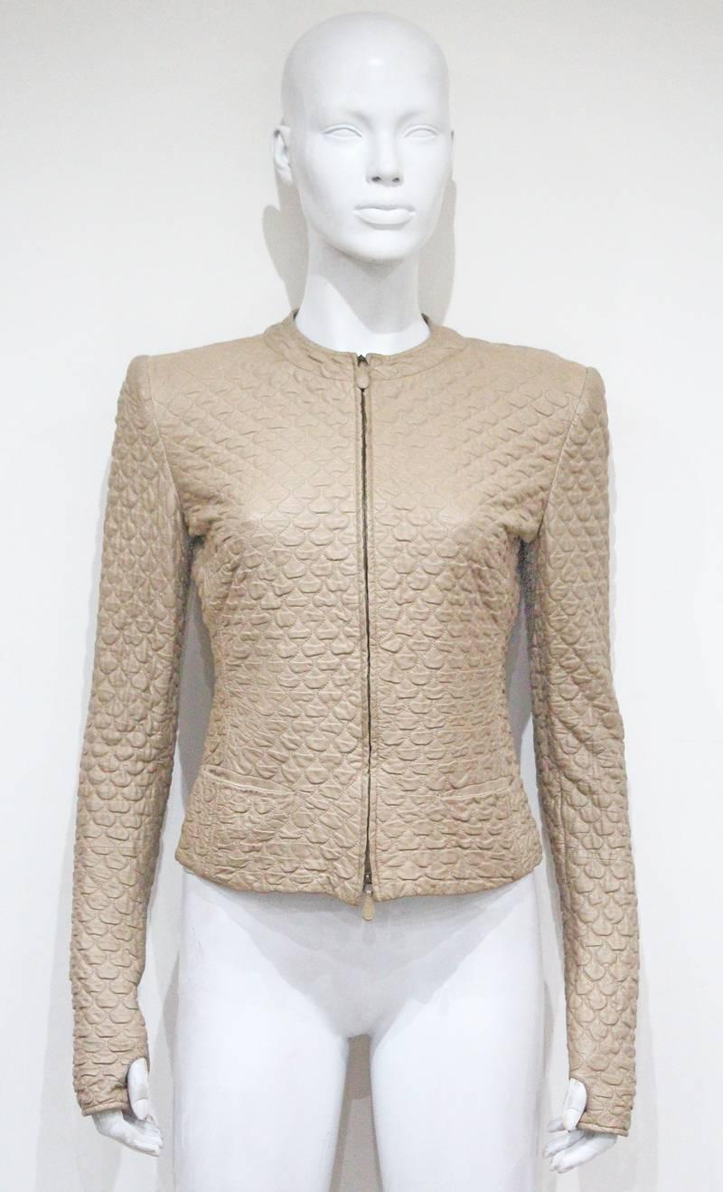 Autumn/Winter 2004 

A fitted quilted leather jacket by Alexander McQueen. Zip closure, thumb hole and silk lining. 

It 42 - Fr 38