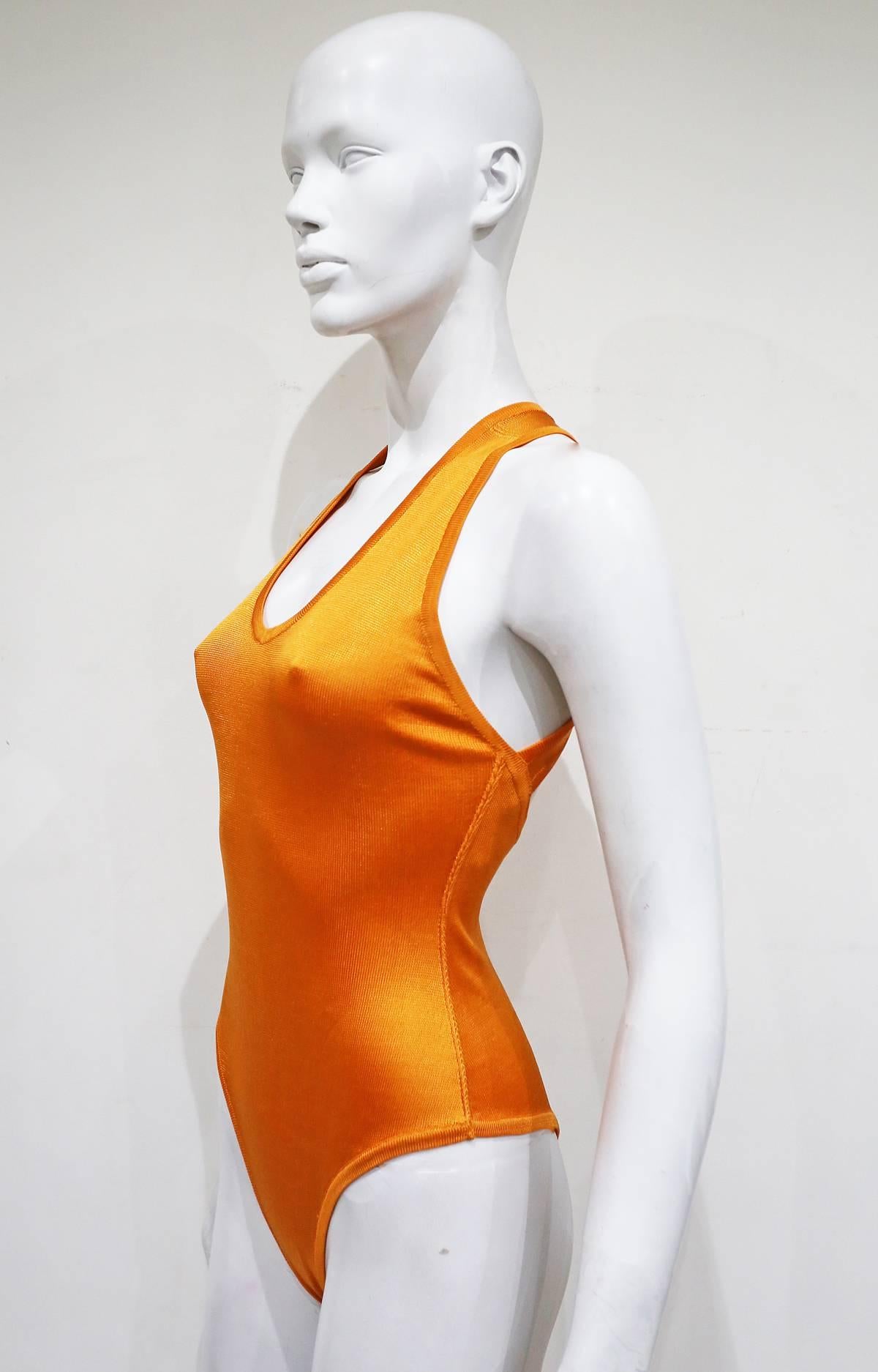 Orange Alaia knitted orange bodysuit with cross over back, c. 1990s