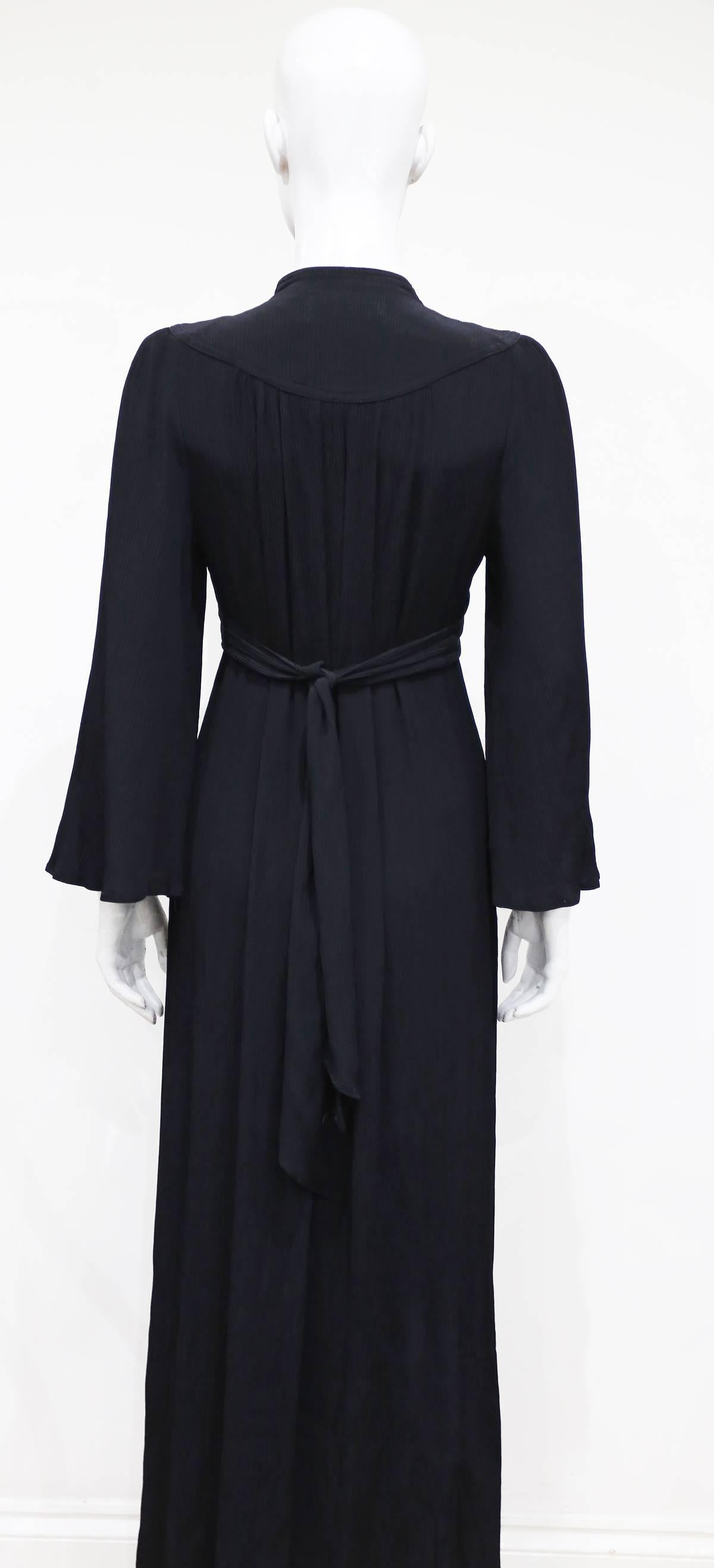 Ossie Clark black pleated evening gown with fluted sleeves, c. 1960s 1