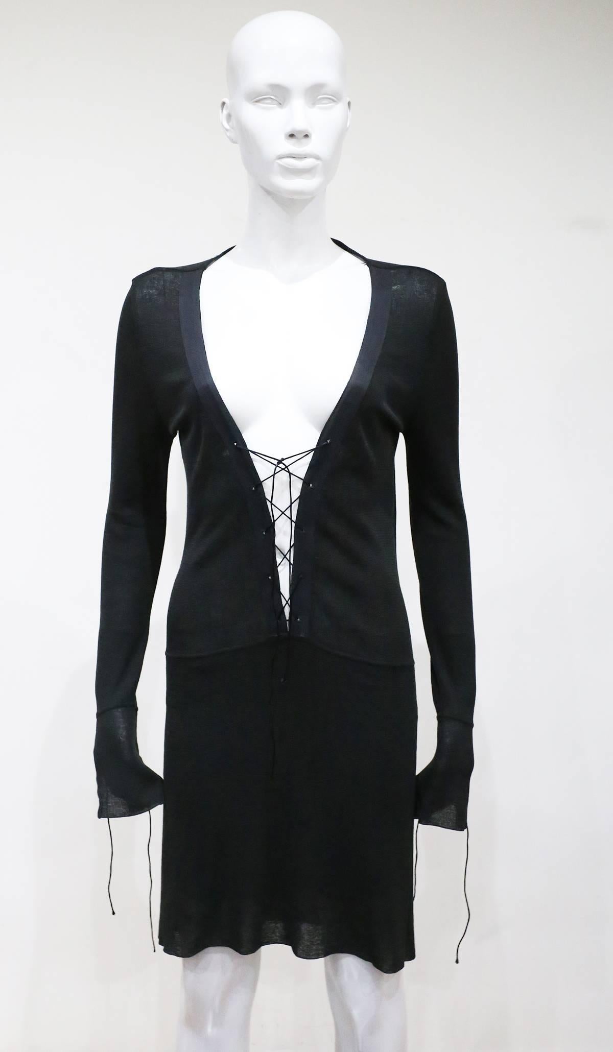 Tom Ford for Gucci knitted black dress with super low plunge and lace up fastenings on collar and cleavage. Circa 1990s. 

XS - S