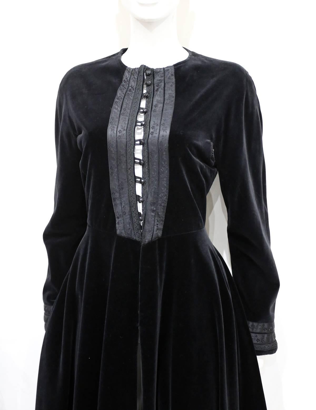 An early and rare Jean Paul Gaultier Russian inspired black velvet evening coat from the 1980s.

It 42 - Eu 38 - UK 10