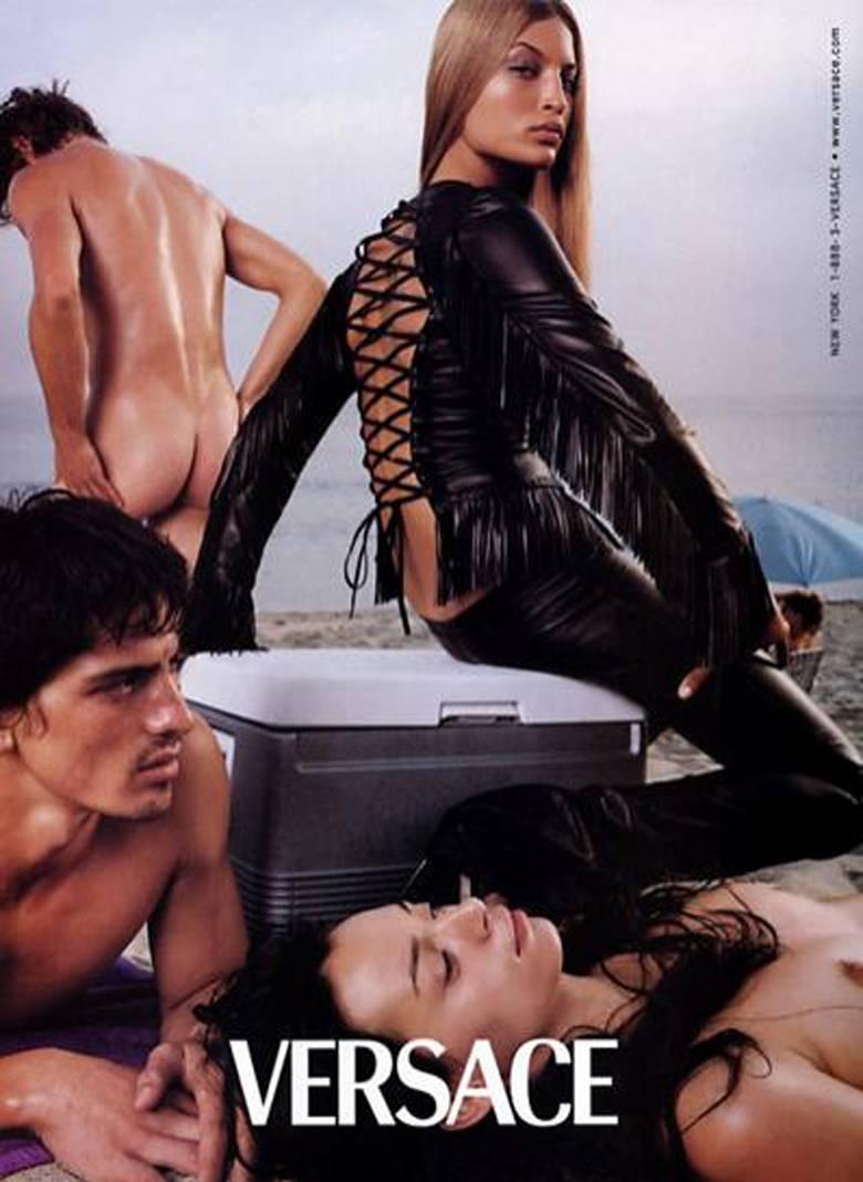 Black Gianni Versace fringed leather jacket with lace up back, c. 2002