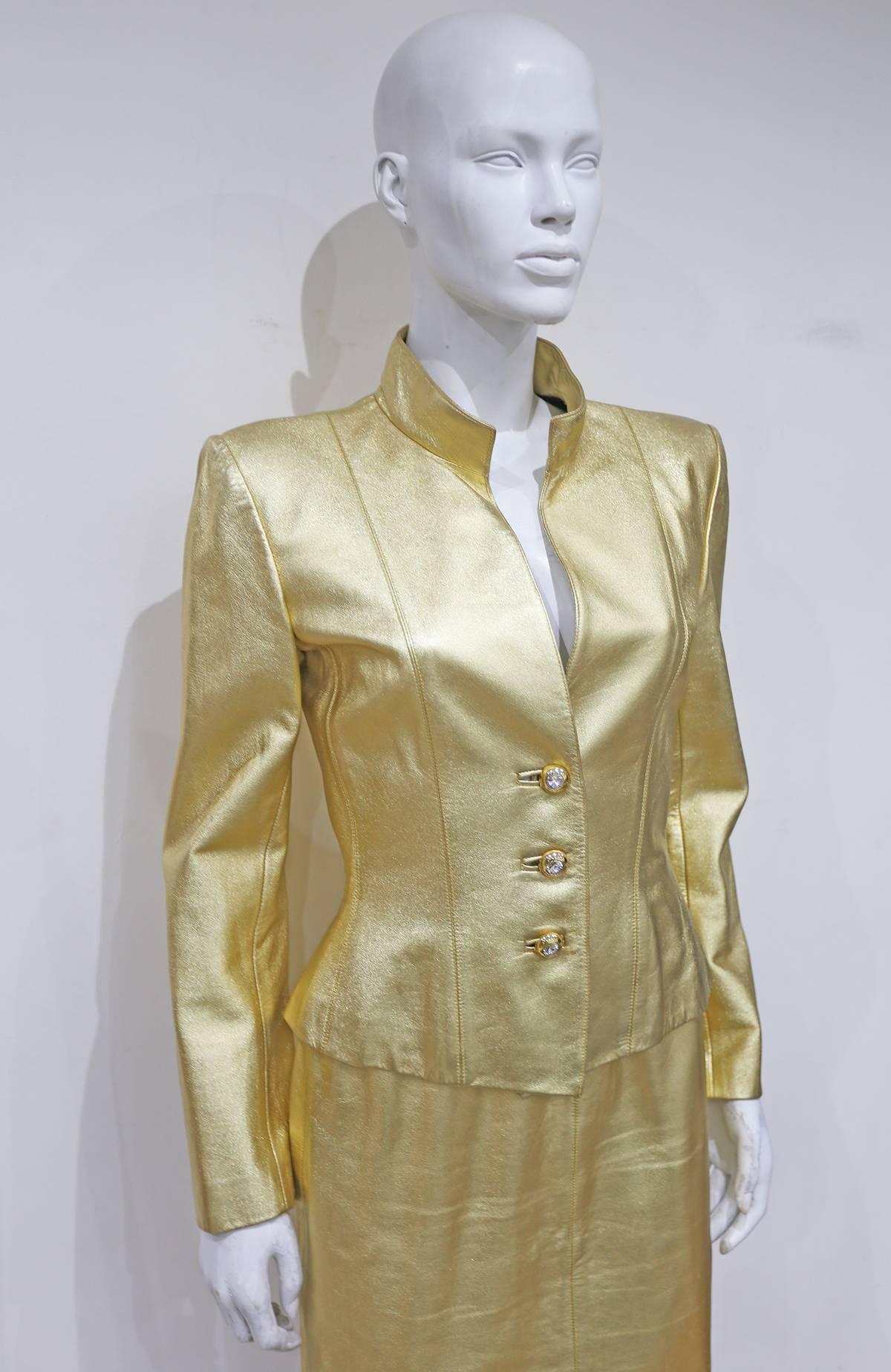 Incredible Yves Saint Laurent gold skirt suit, circa 1979.

Fr 38