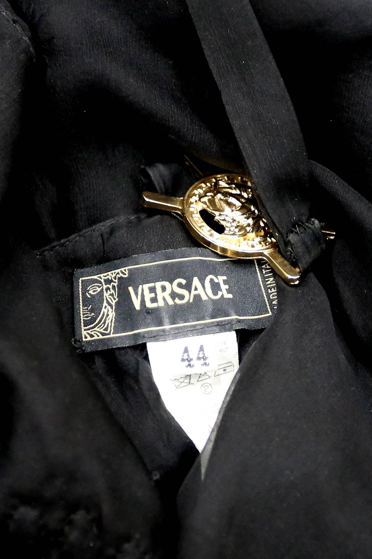 Black Versace bondage medusa harness evening dress with sheer lace panel, c. 2000s