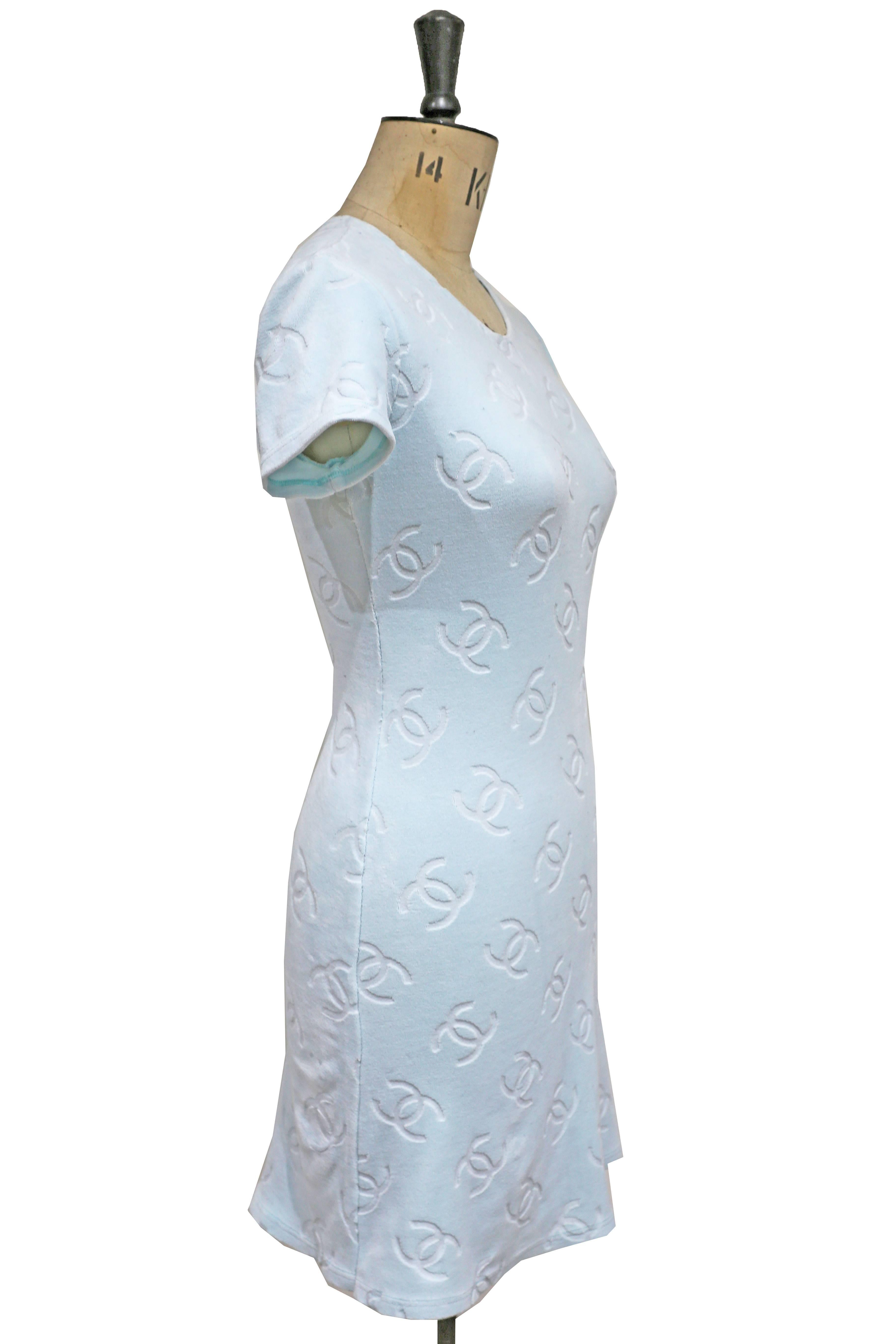 Chanel velour baby blue dress from the spring-summer 1996 collection. The dress features a 'CC' monogram design and is very figure hugging. 

FRENCH (EU) 40 - ITALIAN 44 - UK 12 - US 8 - MEDIUM