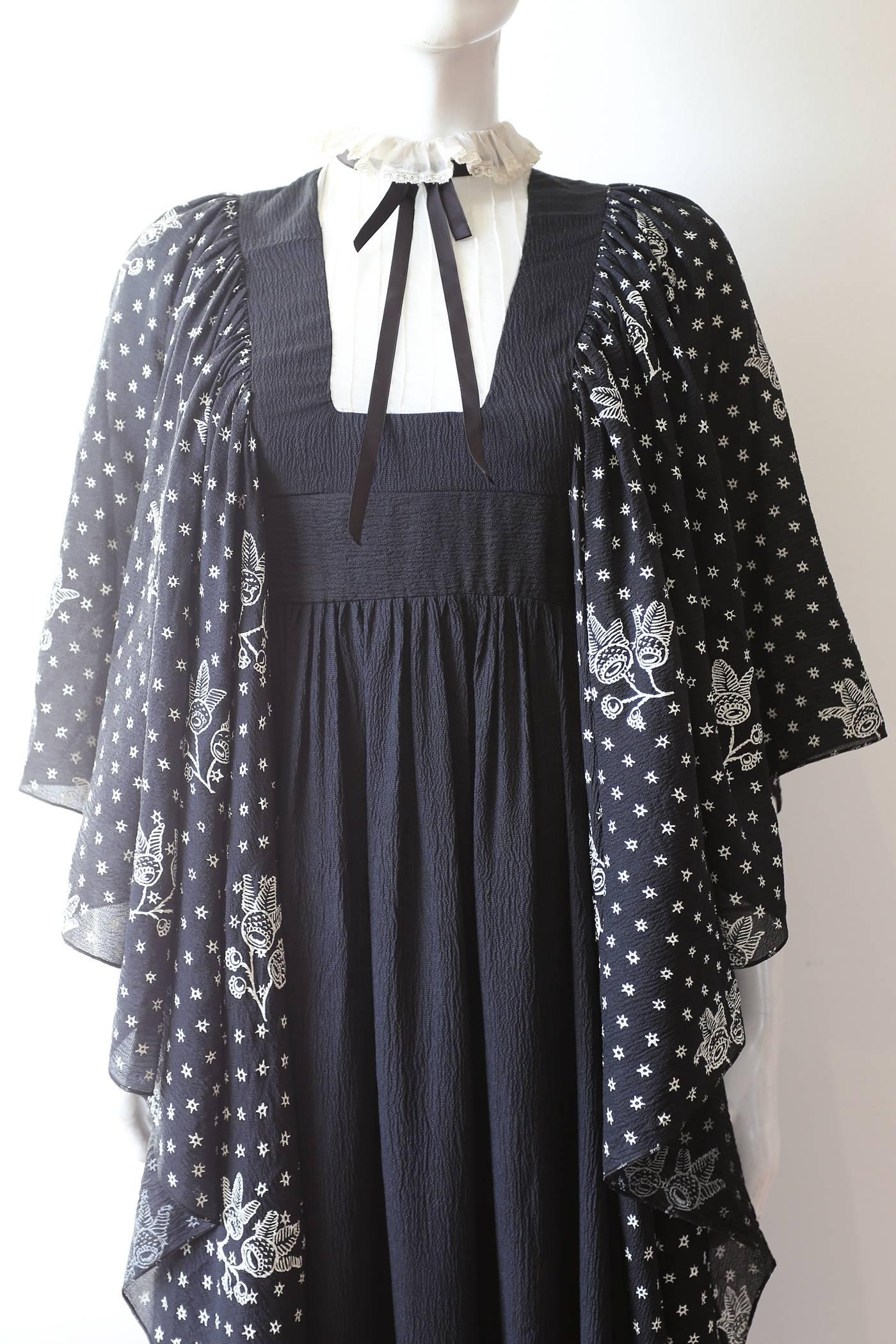 Black Gina Fratini crêpe-silk evening dress with star print, c. 1970