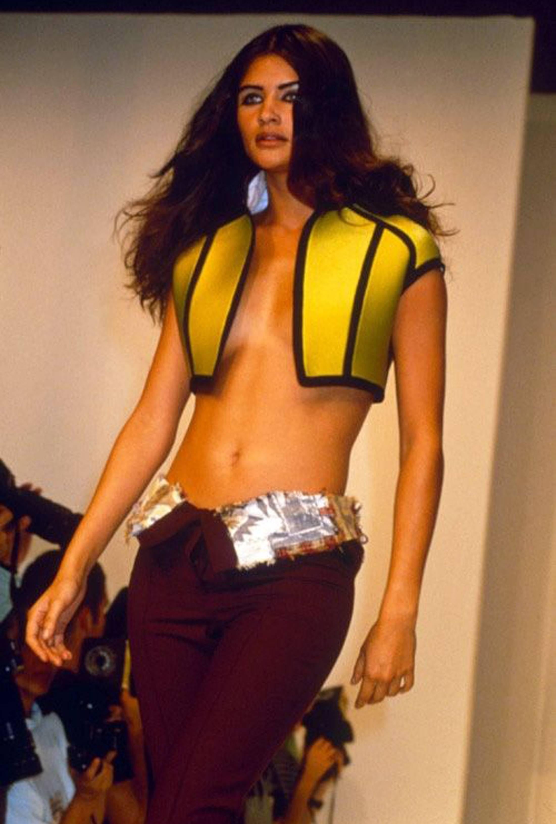 Early and rare John Galliano cropped bolero tennis ball jacket from the autumn - winter 1990 runway collection, modelled by Helena Christensen. 

