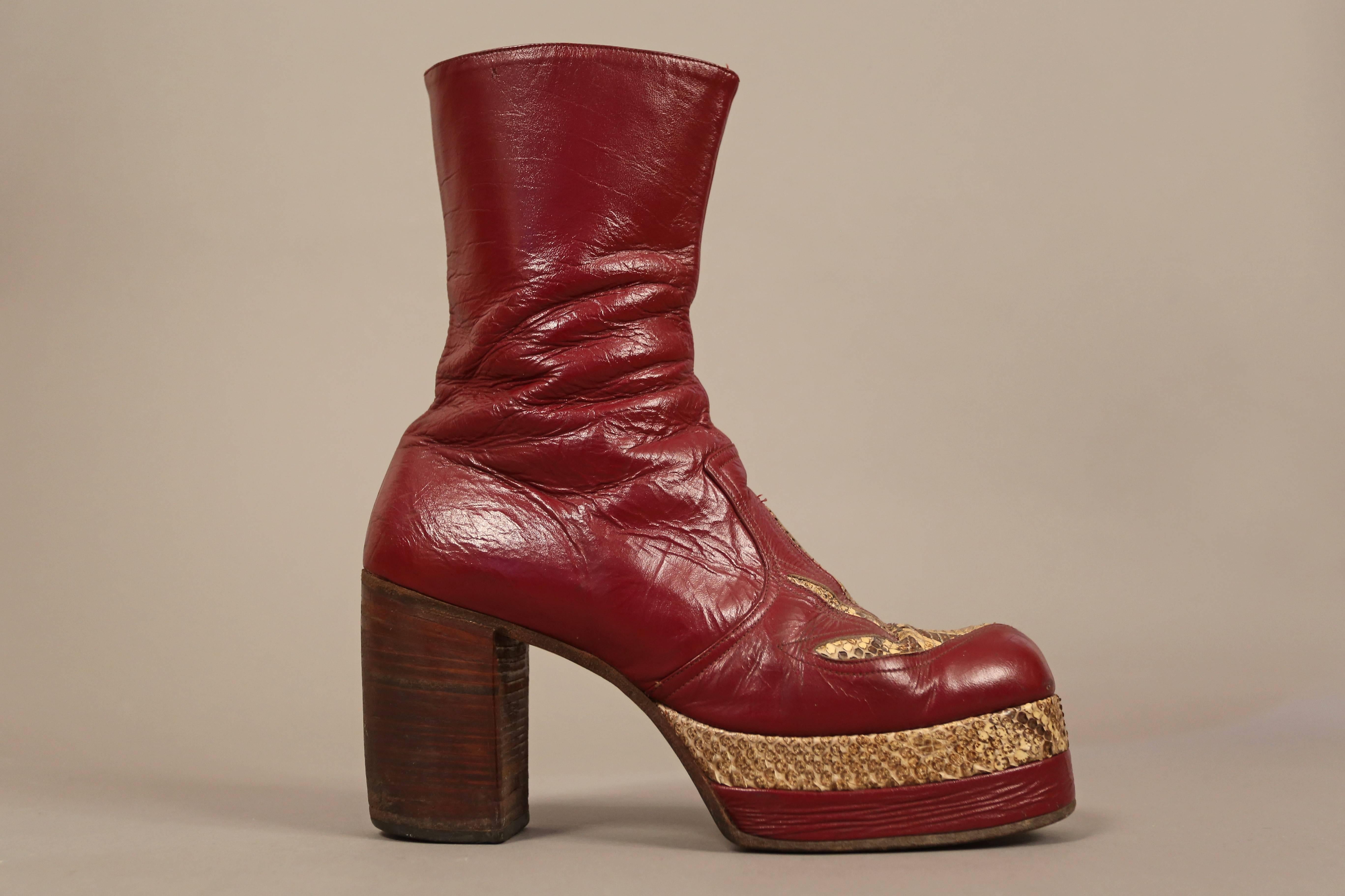 A rare pair of original 1970s mens burgundy leather platform boots with snakeskin, made in England. 

Platform 1.5