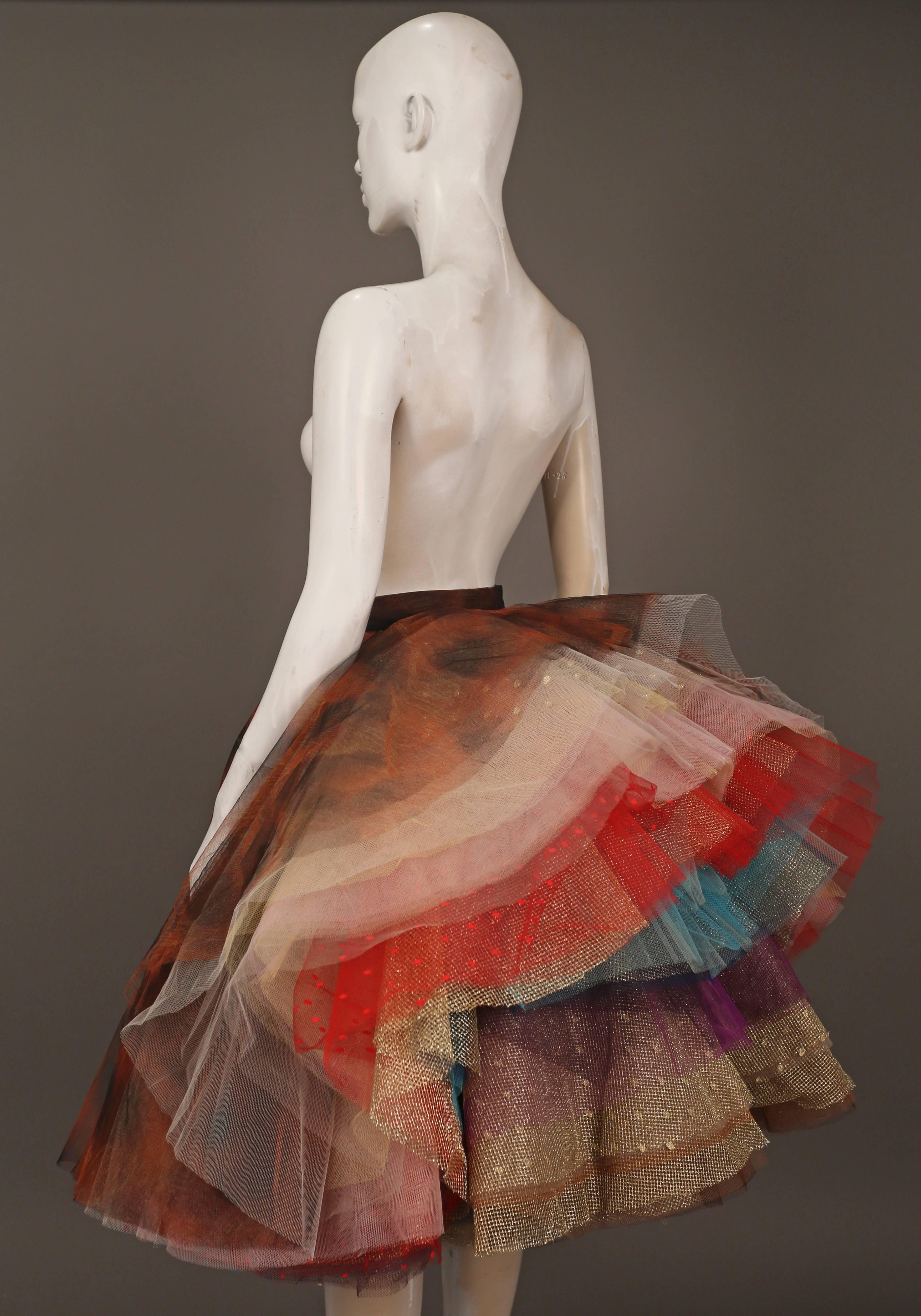 #ARTATTACK 

Super rare Vivienne Westwood 'EXPLOSION' layered tulle skirt, circa 1993. The skirt has 34 layers of tulle in various prints and colours, only 12 copies of this design were made and sold exclusively to Westwood's VIP clients.