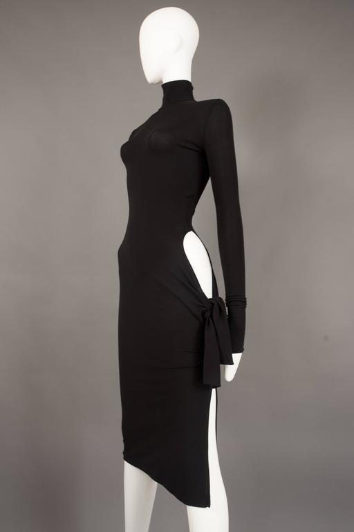 Dolce And Gabbana Black Bodycon Evening Dress With Cut Out Circa An Iconic And Rare Dolce Gabbana Bodycon Evening Dress From The Spring Summer 2001 Collection