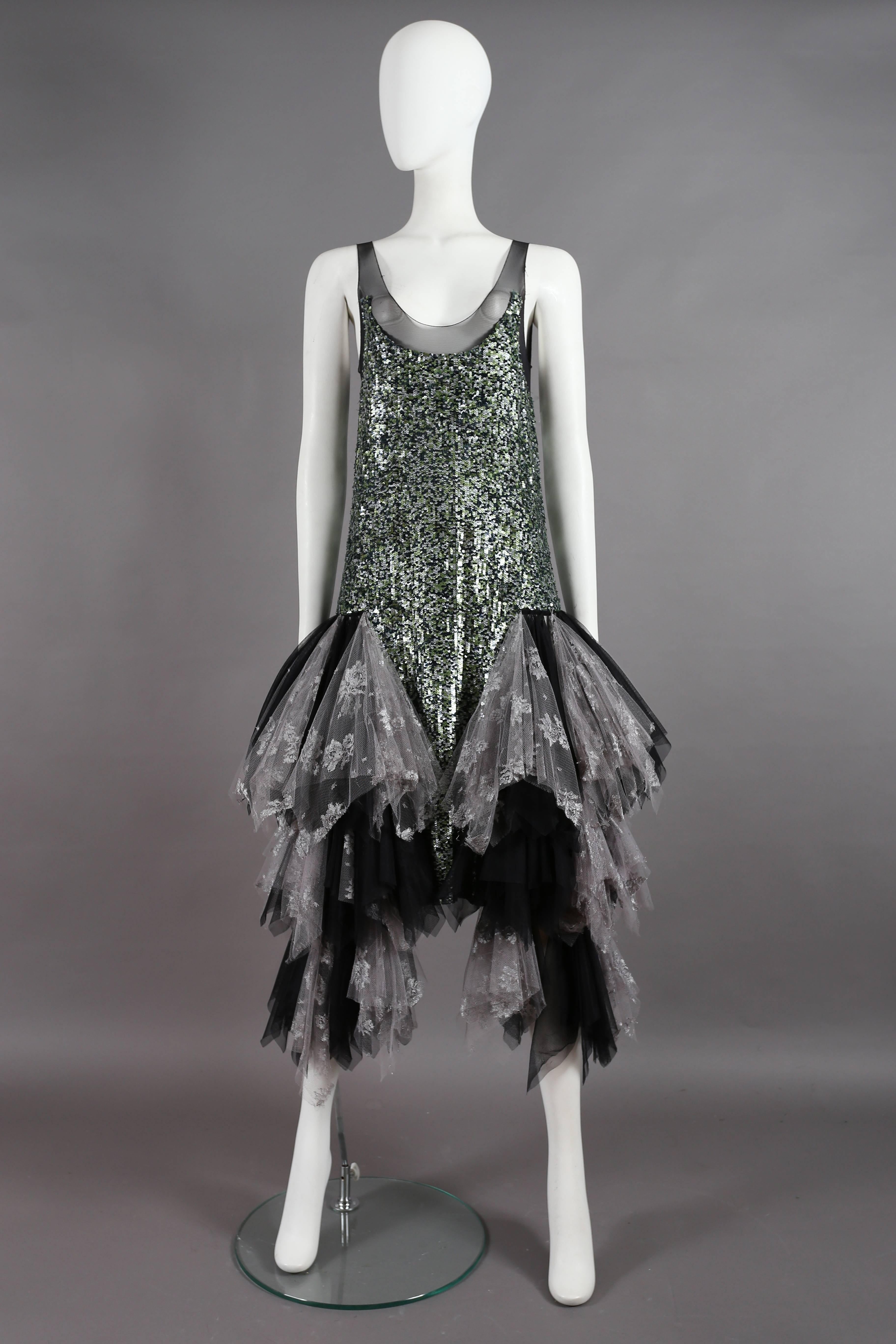 Fine and Rare Alexander McQueen sequined flapper dress with voluminous layered tulle skirt, Autumn-Winter 2001 'What A Merry Go Round' collection.

EU 38   IT 42