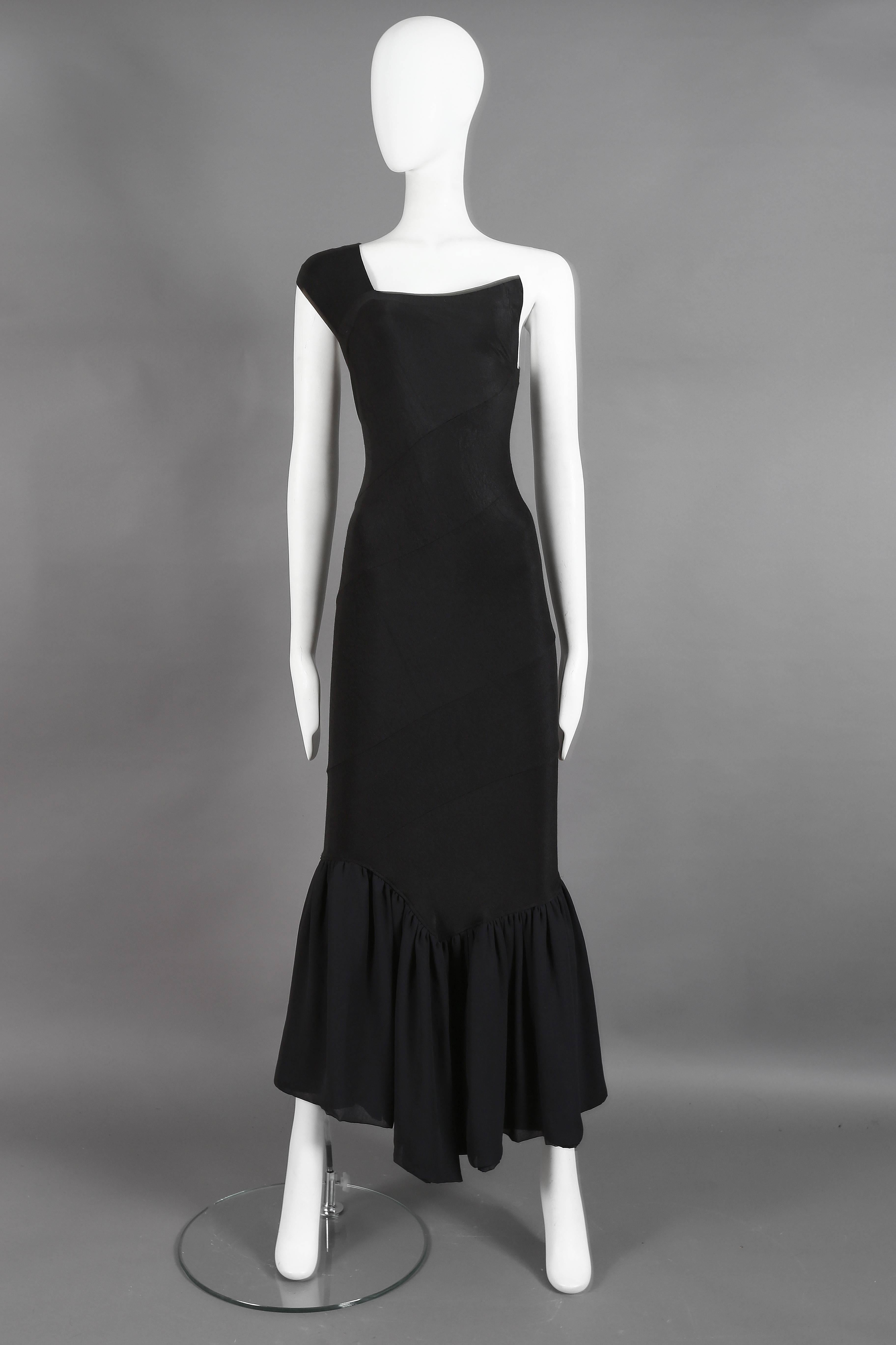 Early and rare COMME des GARCONS black knitted bias cut gown with layered fish tale skirt, spring-summer 1986.