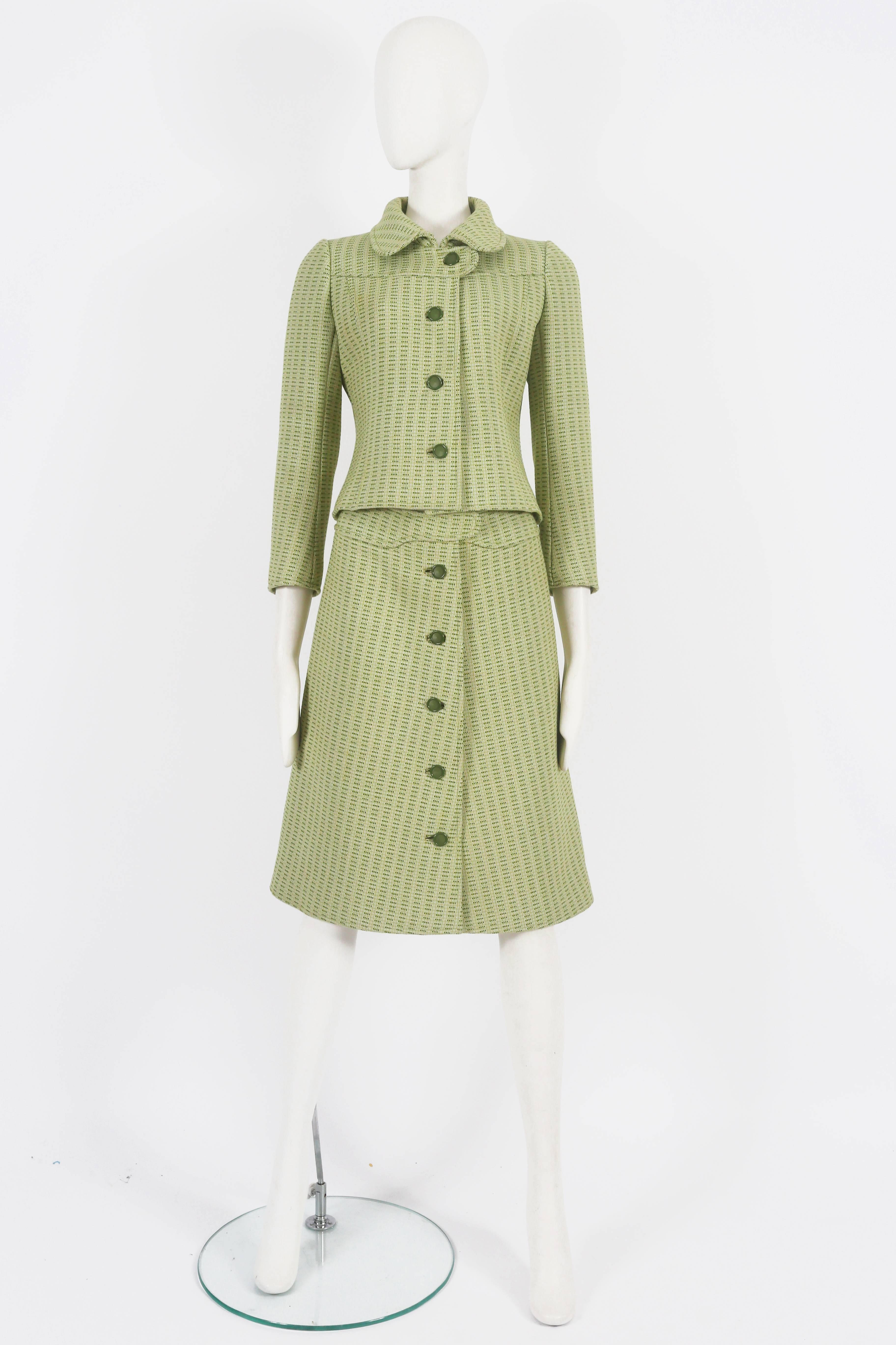 Presenting a fine and rare Haute Couture Courreges skirt suit, a timeless treasure dating back to circa 1969. This exquisite suit showcases impeccable tailoring and attention to detail, truly embodying the essence of haute couture