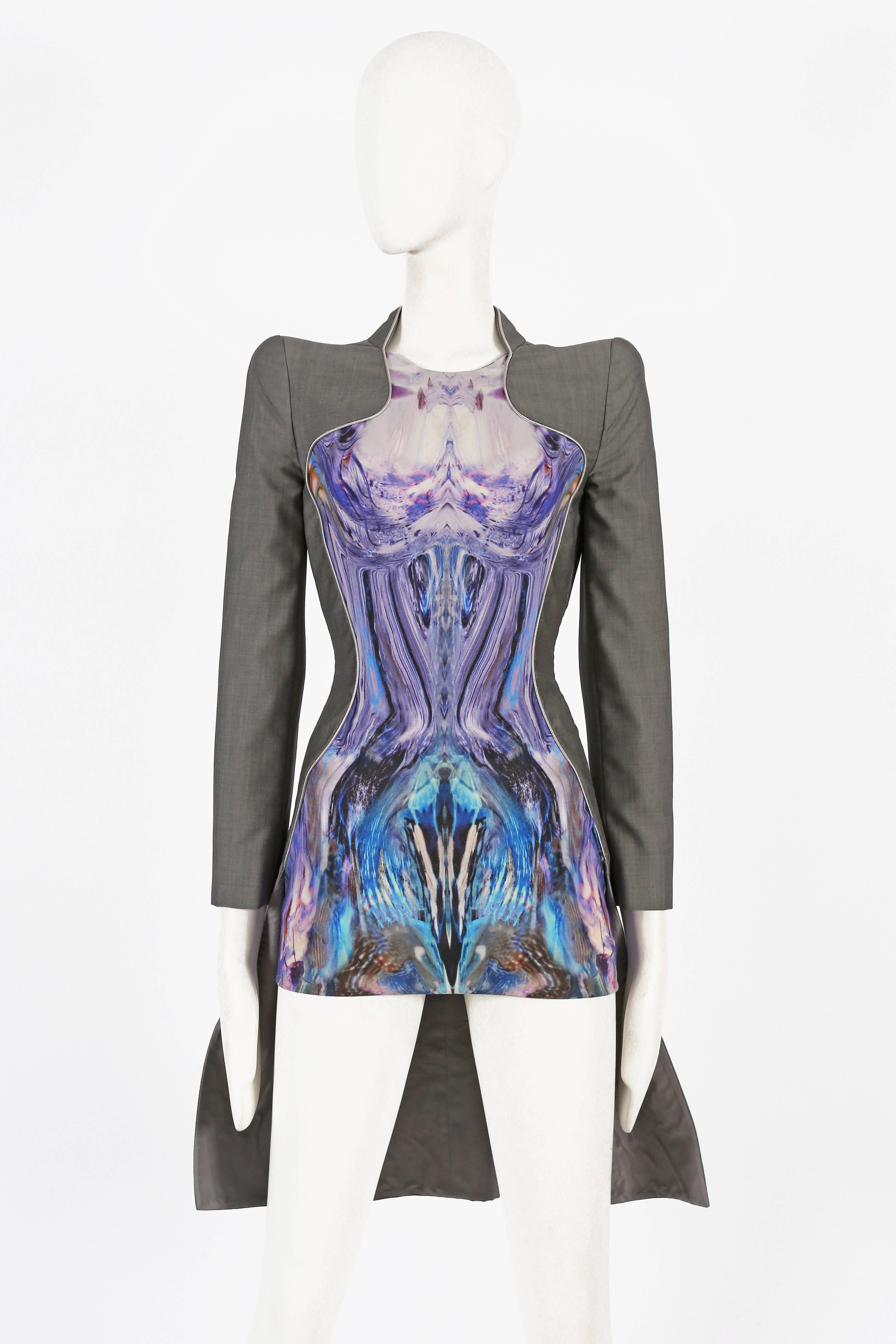 Extremely rare Alexander McQueen mini dress from his last collection 'Plato's Atlantis' Spring/Summer 2010. The dress features sharp tailoring throughout, padded shoulders, metallic piping and a digitally mirrored print of Jellyfish on a knitted