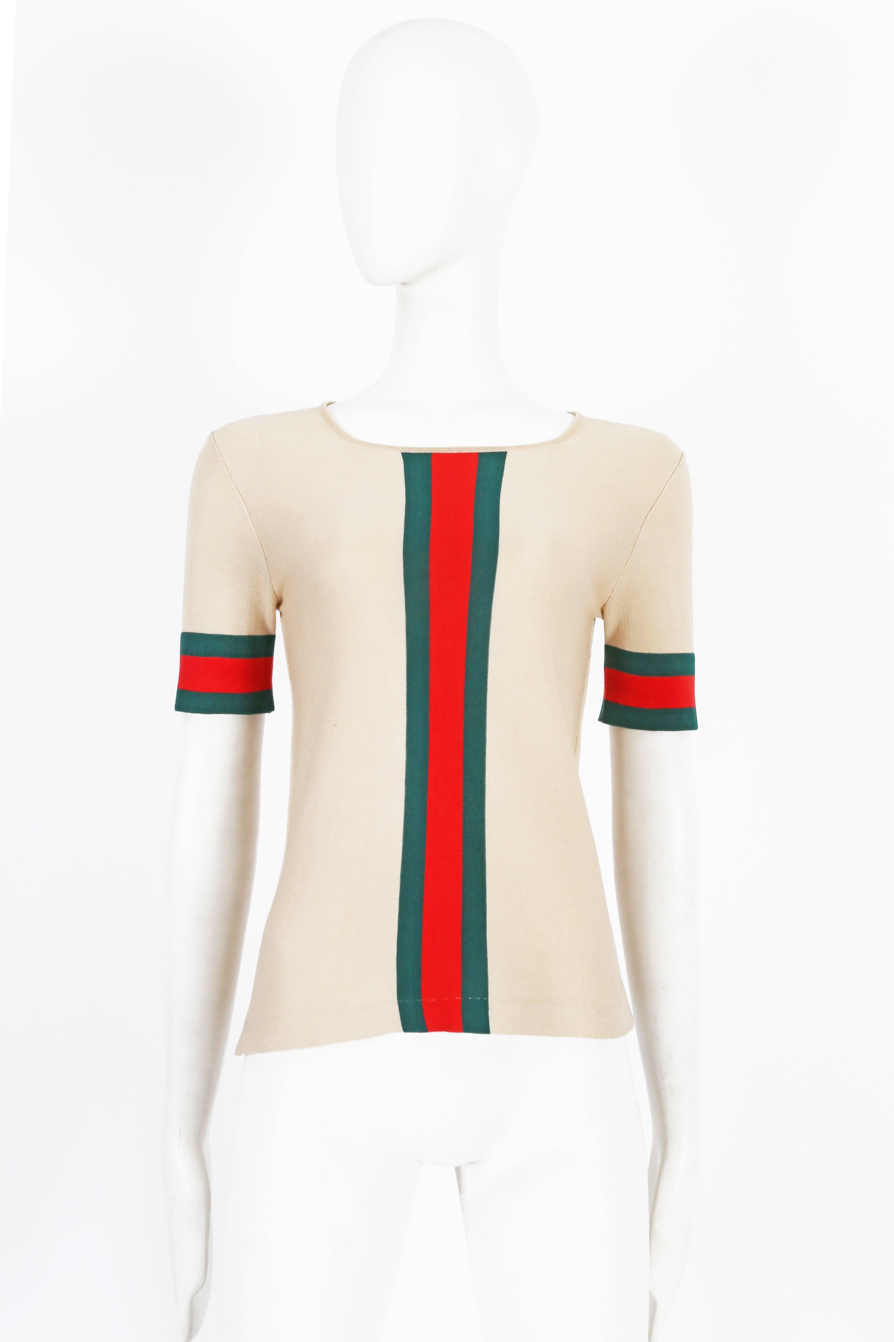 A rare knitted 1970s Gucci t-shirt featuring the iconic green and red stripe down the center front and cuffs.