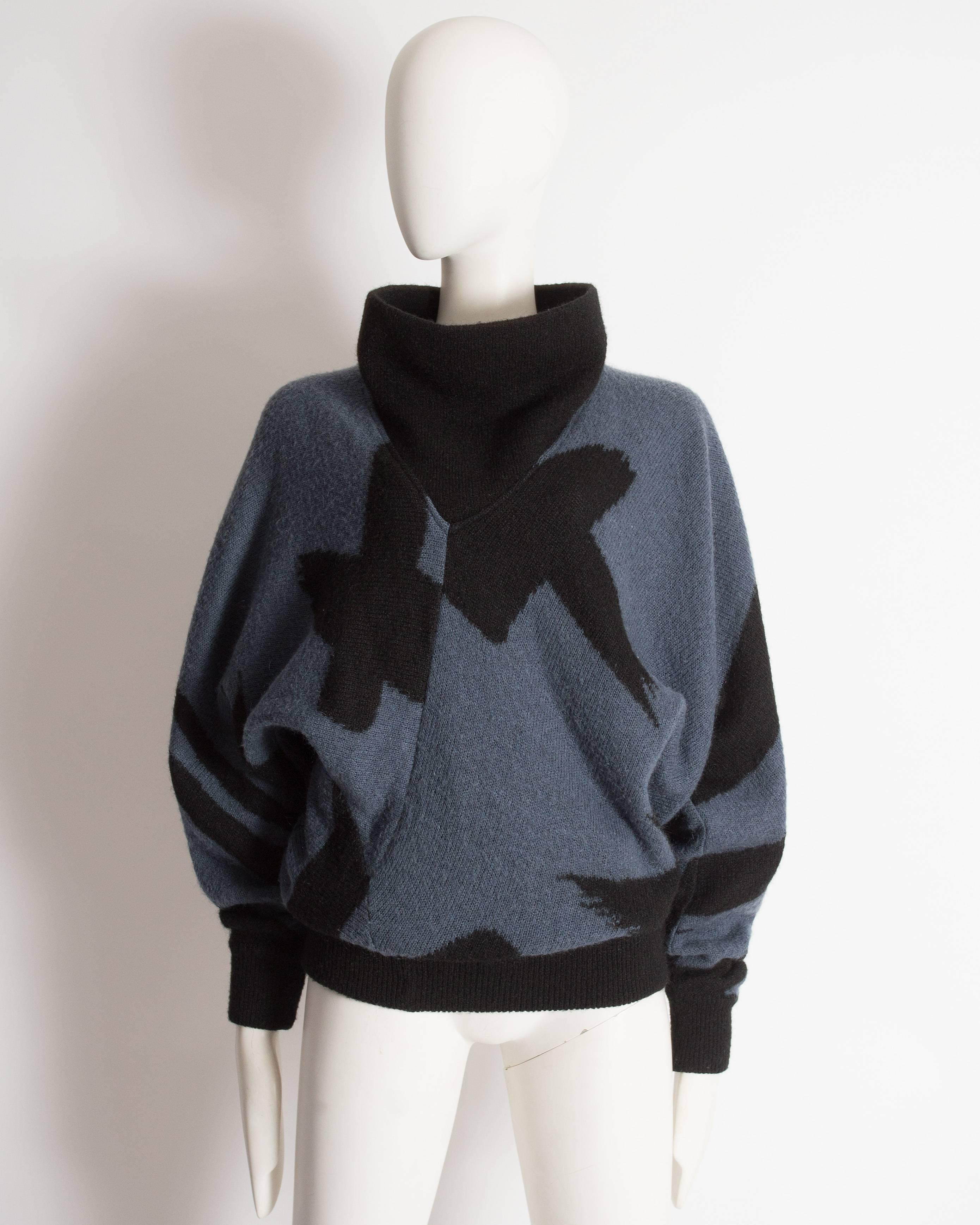 Issey Miyake oversized wool sweater with large cowl neck.

Circa 1980-1988