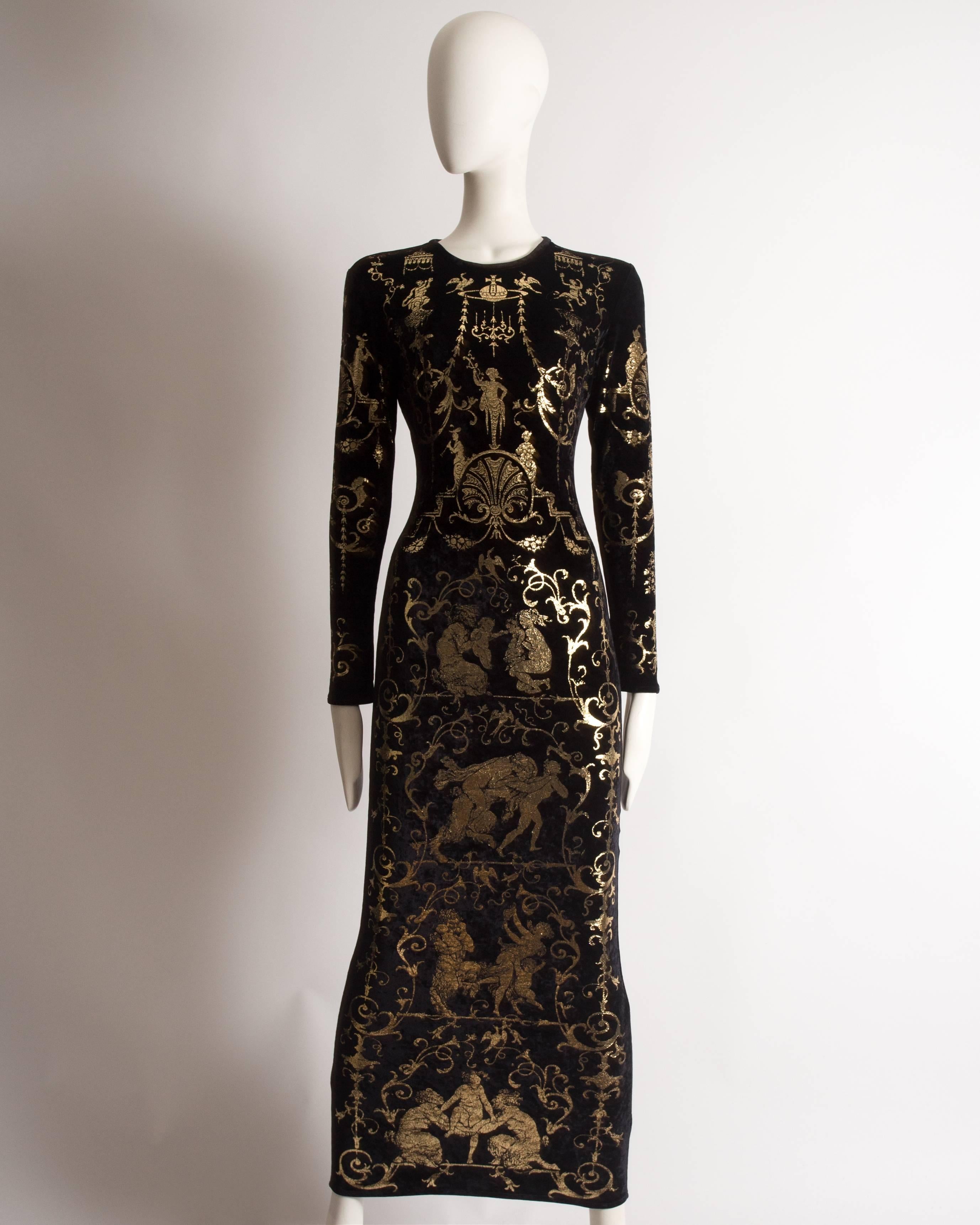Important Vivienne Westwood long fitted sheath dress constructed in black viscose/lycra with long sleeves, scoop neck, and zip closure. Screen-printed gold with neoclassical designs inspired by the Mirror with marquetry by Andre-Charles Boulle
