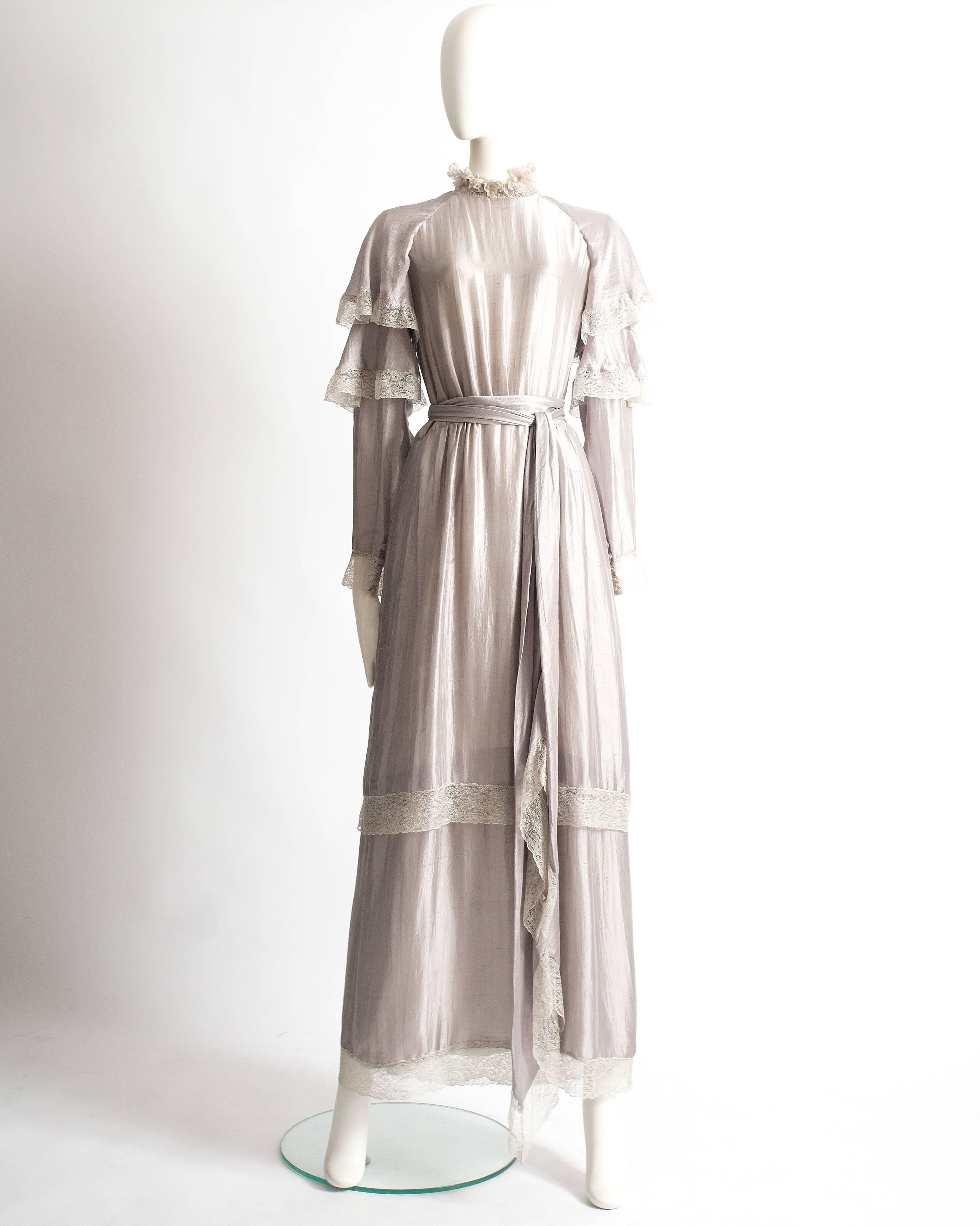 Tan Giudicelli raw silk evening dress with ivory lace trimmings throughout and button closure at the back. 

Circa 1970s