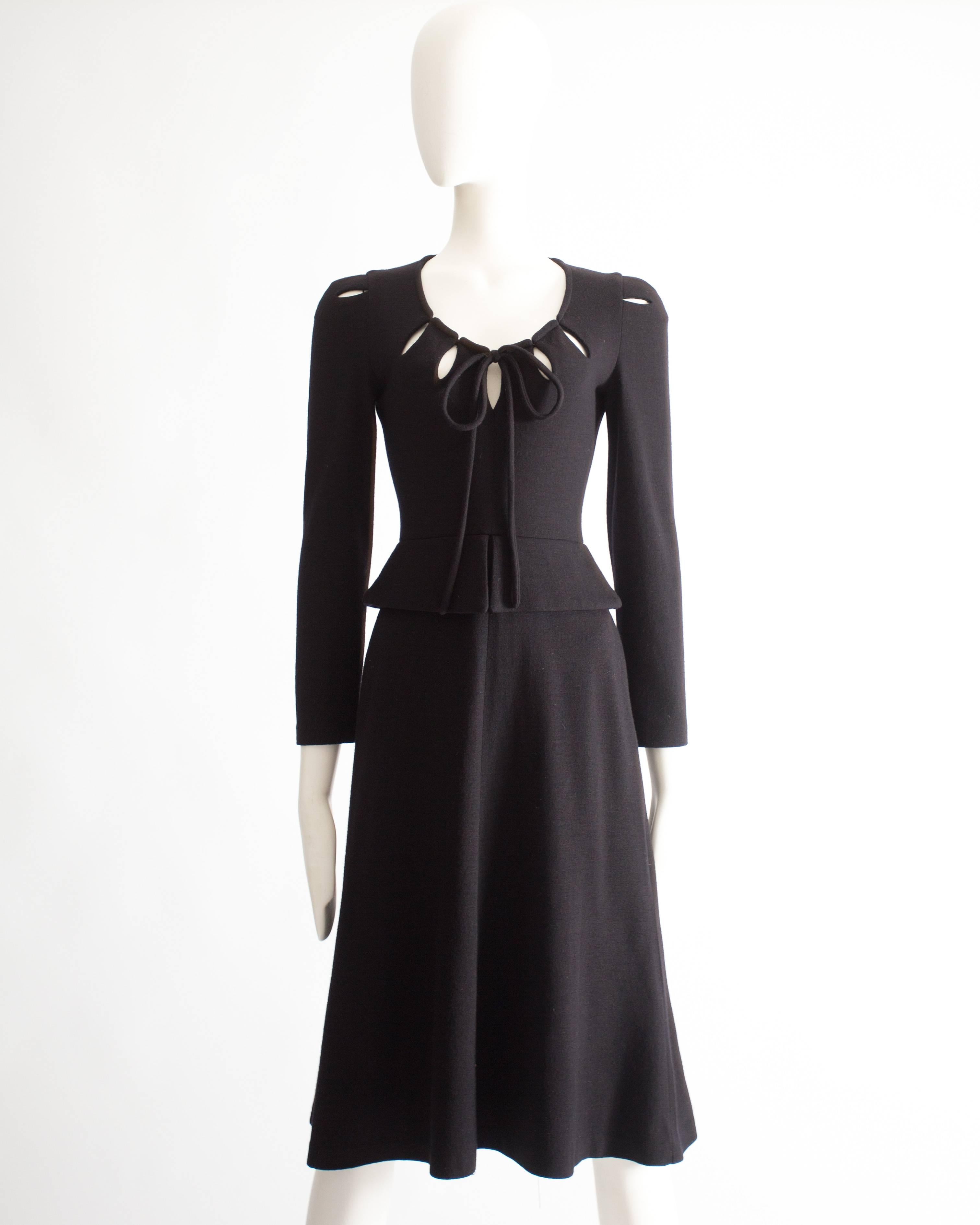 Ossie Clark black wool mid-length dress with cut-outs on the collar and shoulders with string fastening on the bust.
