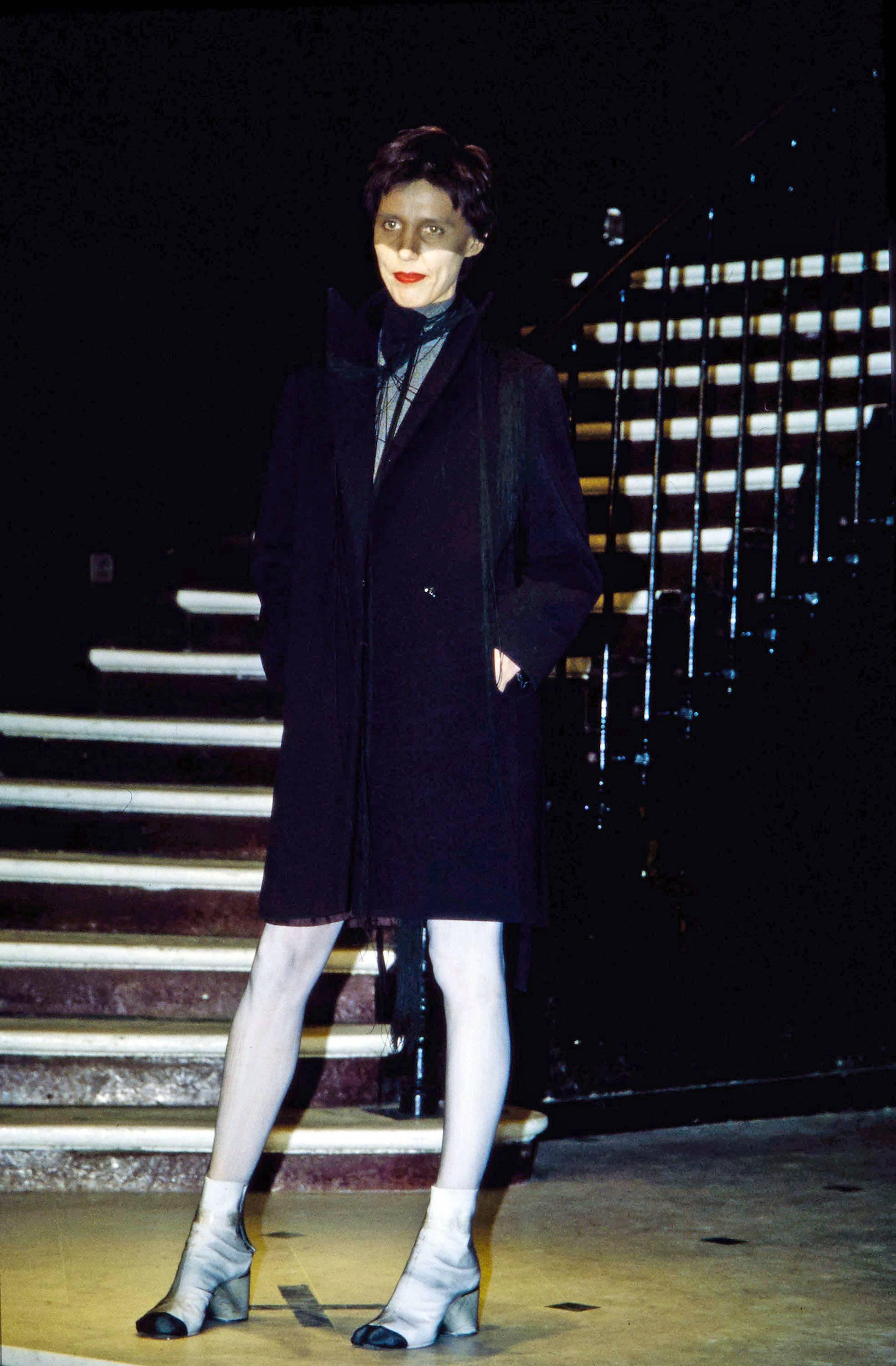 Introducing an iconic Maison Martin Margiela black wool oversized coat from the Autumn-Winter 1996 collection. This coat exemplifies the designer's avant-garde approach to fashion and innovative design.

With its loose fit and exaggerated standing