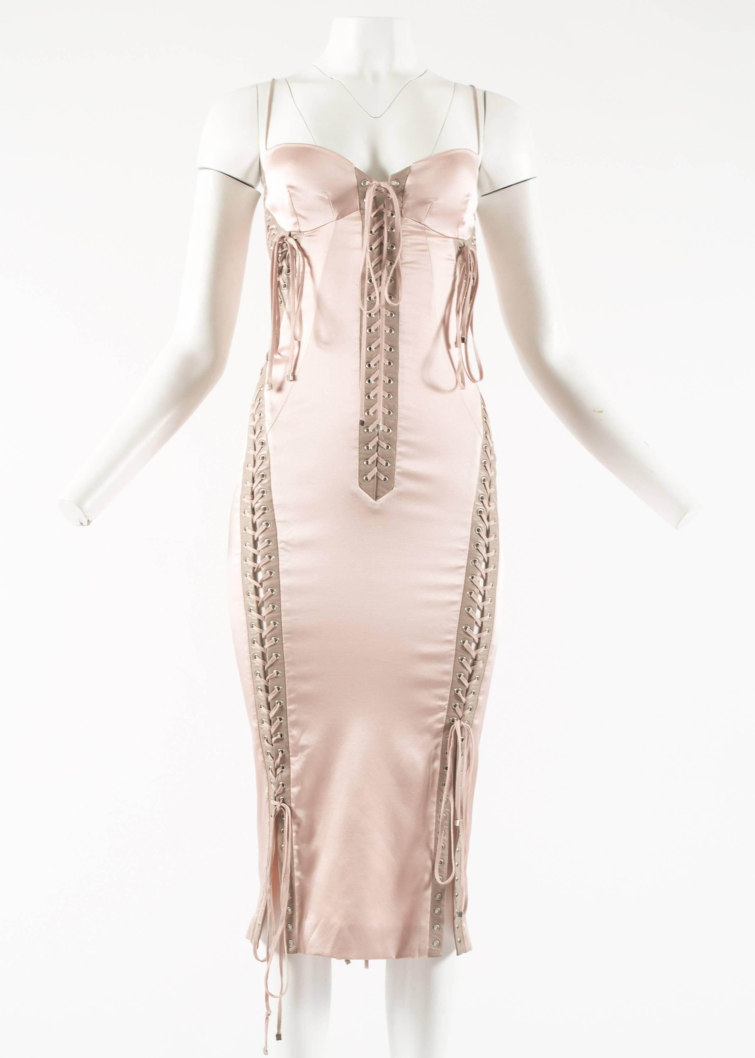 Dolce & Gabbana Spring-Summer 2003 

- rose pink silk with a slight stretch 
- lambskin leather trim 
- adjustable lace up fastenings throughout 
- hidden zip closure at the back 
- Fr 38 - It 42 - UK 10
