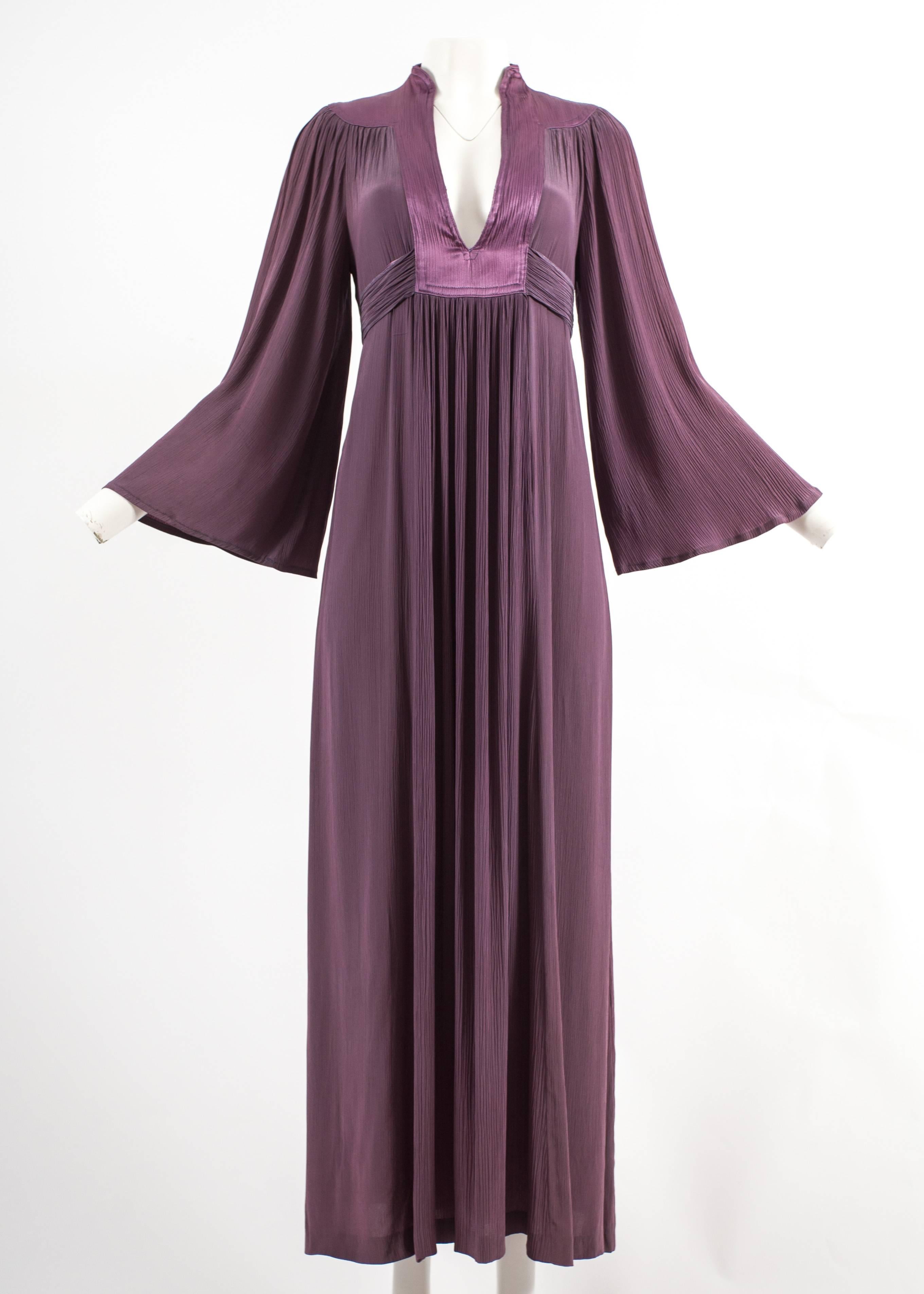 Ossie Clark 1970 pleated purple evening dress

- satin yoke 
- fluted sleeves
- attached waist belt

