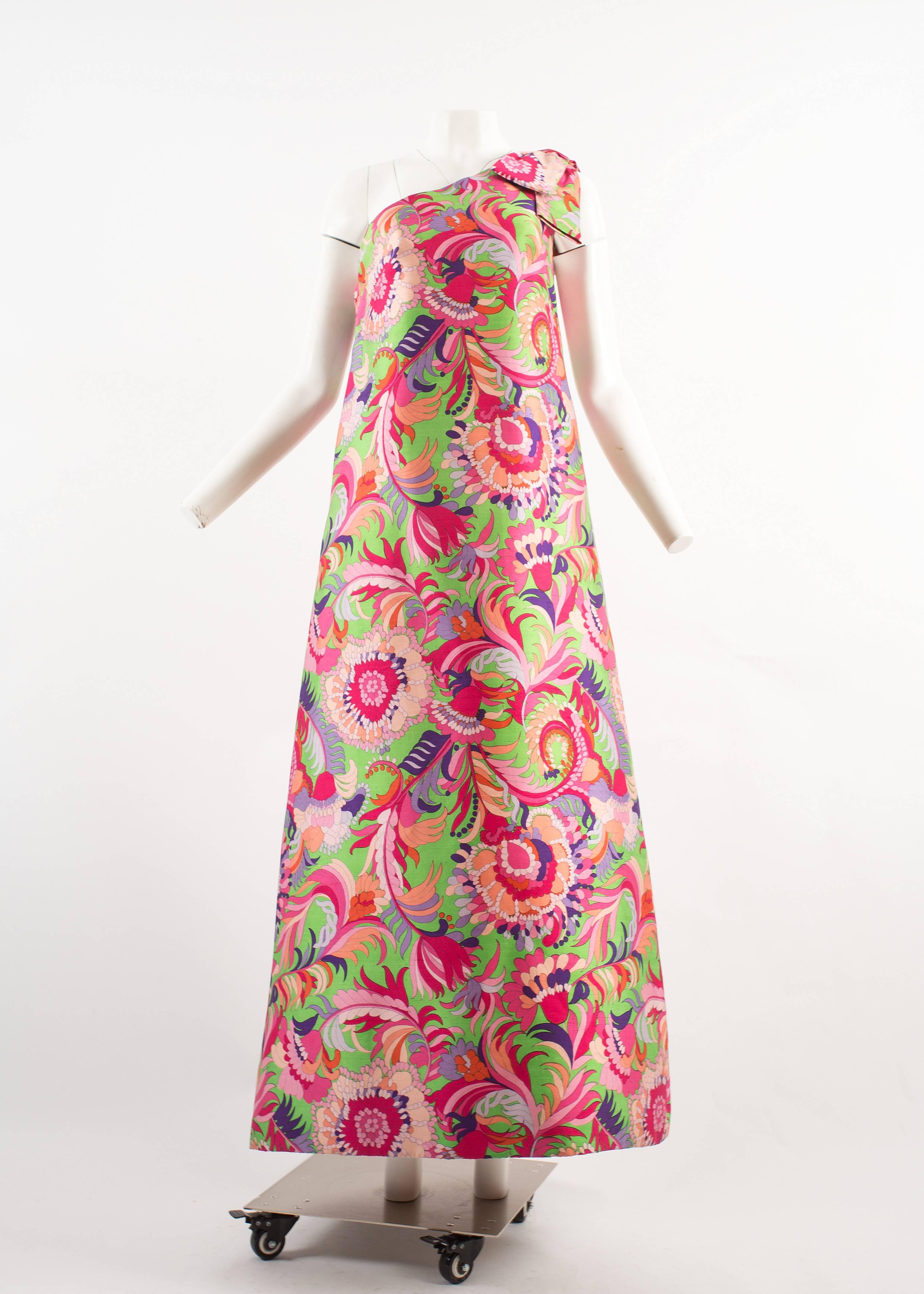 Christian Dior 1960s asymmetric silk evening a-line dress

- vibrant psychedelic printed on raw silk
- large bow hangs on shoulders
- internal corset with boning
- matching shoes designed by Charles Jourdan
- made to a couture standard