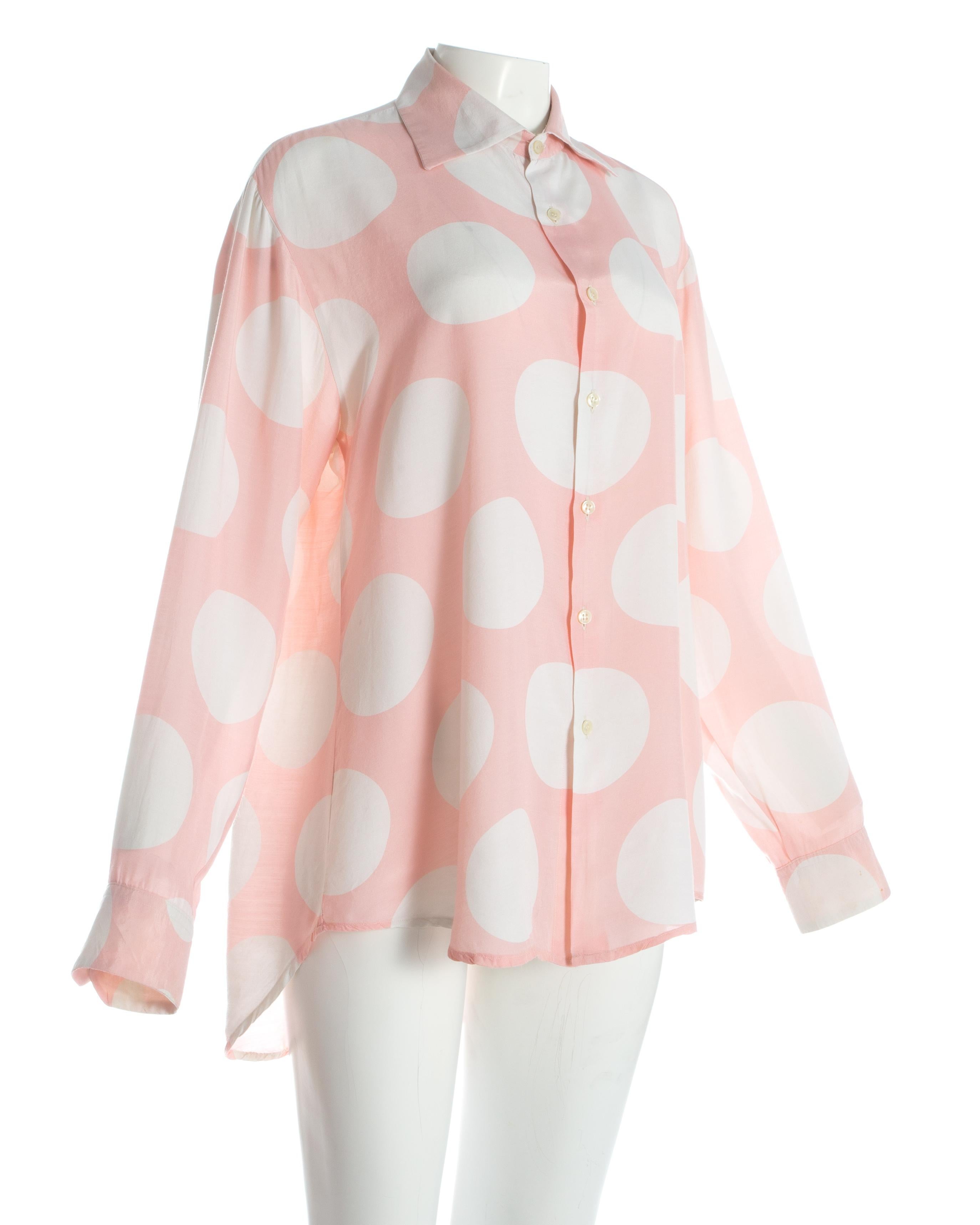 pink and white polka dot shirt
