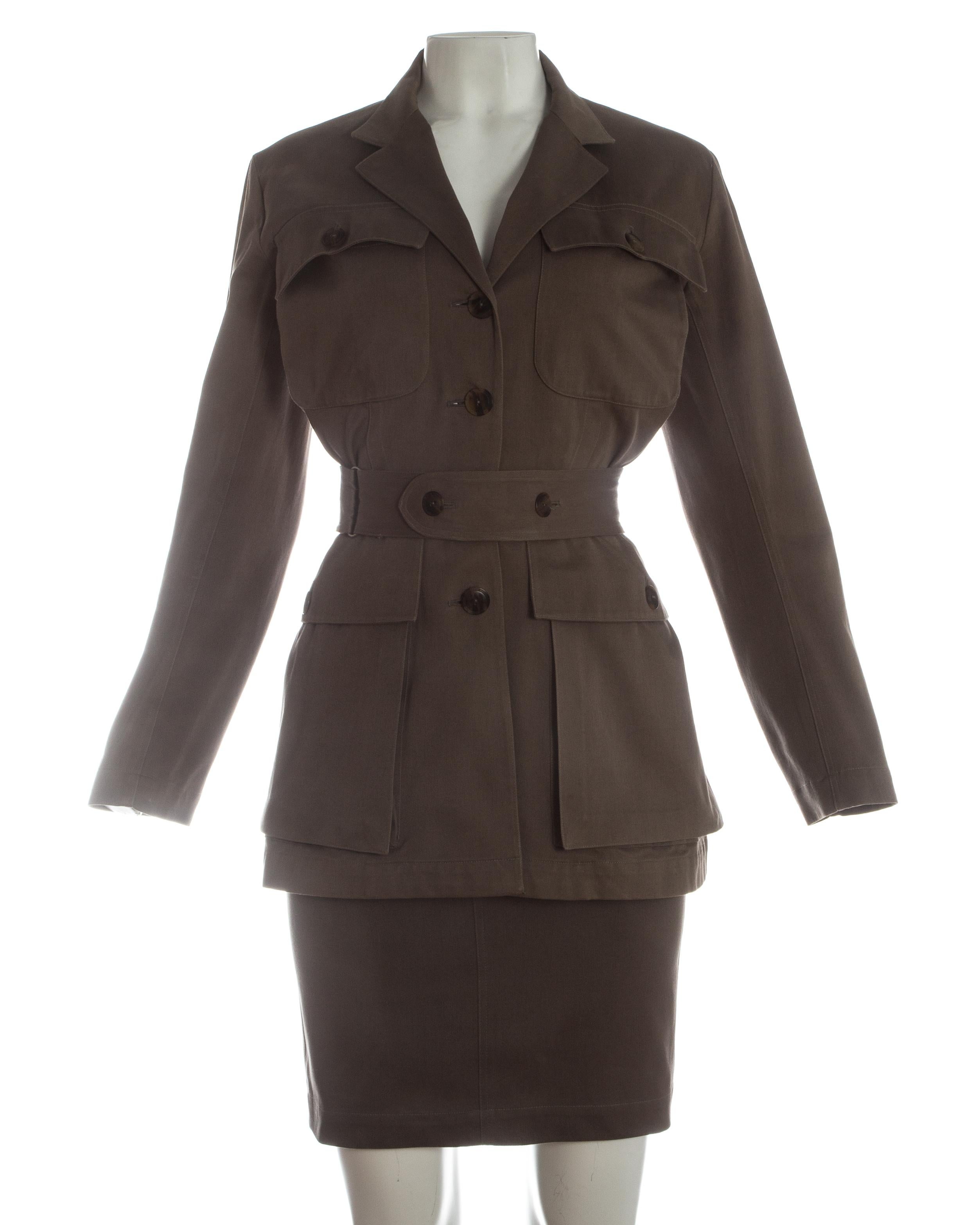 - Safari jacket with notched lapels,  four large flap pockets, four button closure, matching adjustable belt
- High waisted fitted pencil skirt finishing just above the knee 

Spring-Summer 1990
