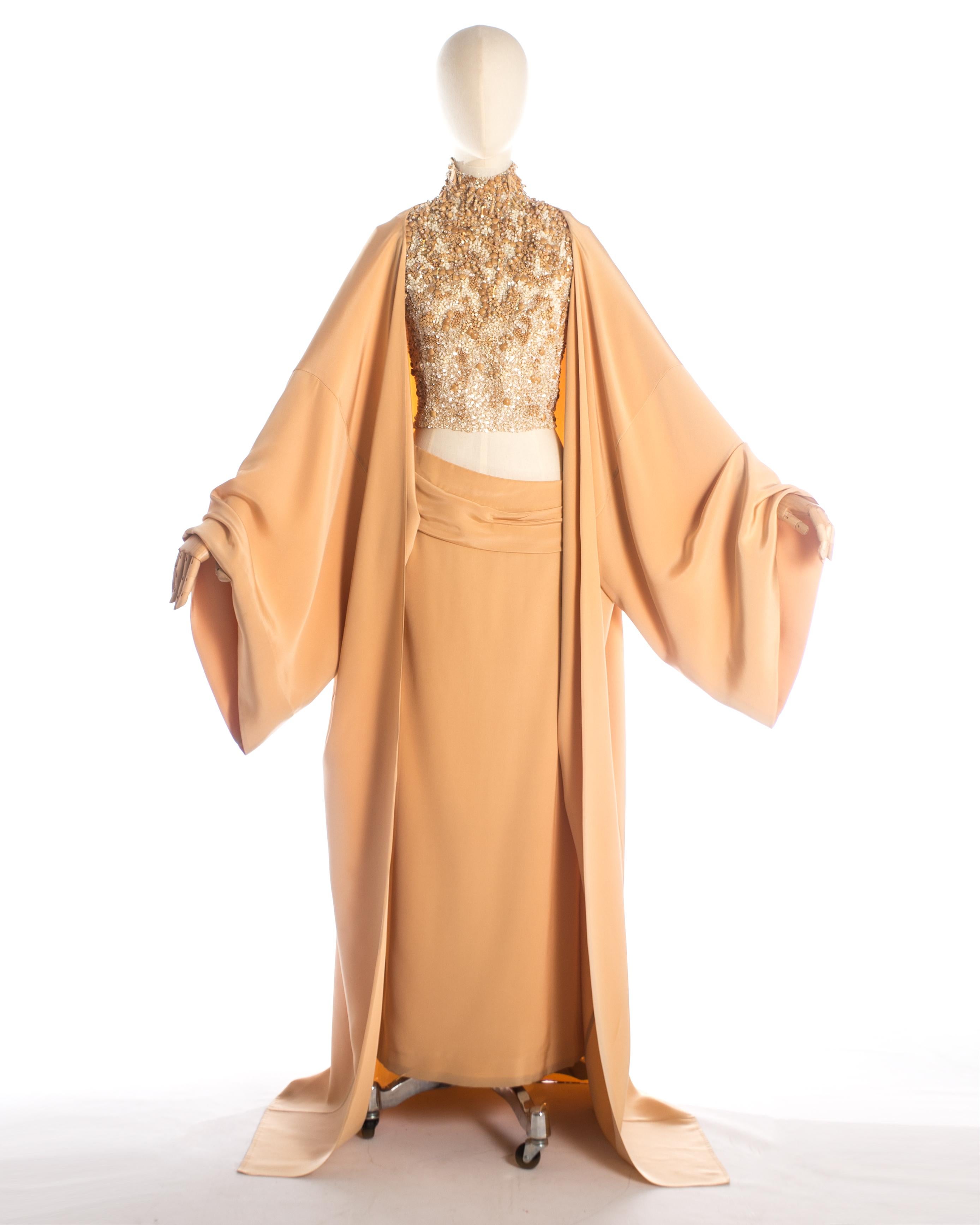 - Haute Couture
- Full length kimono
- Full length skirt with draped, irregular waistline 
- Organza bodice covered in wood, cork, rhinestone beads and pearlised sequins
- Designed by Stephane Rolland 

Spring-Summer 1999, Look #24