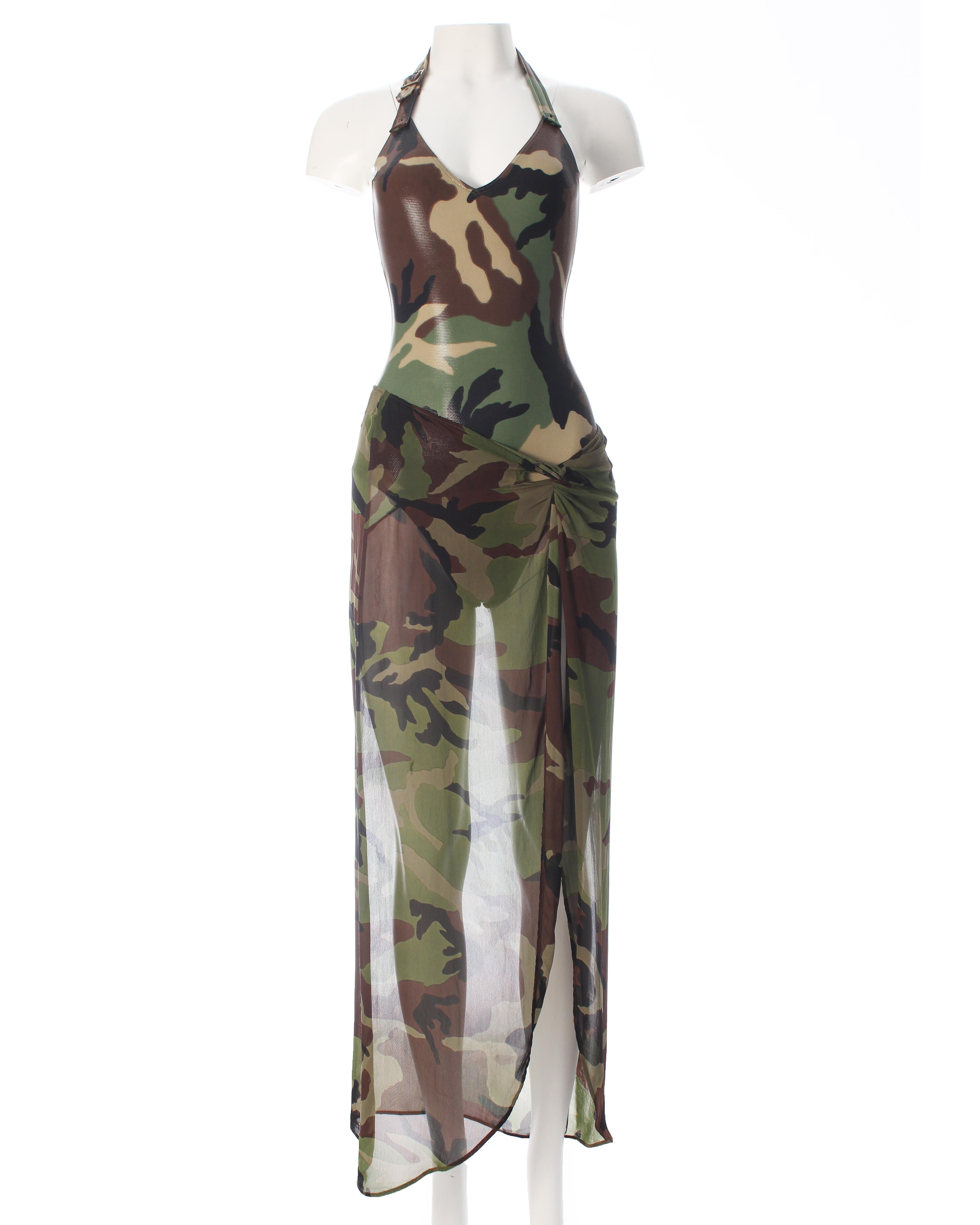 - camouflage printed lycra bodysuit with brass buckle on strap 
- semi-sheer sarong style viscose skirt with elastic waist and pre-tied knot 

Spring-Summer 2001