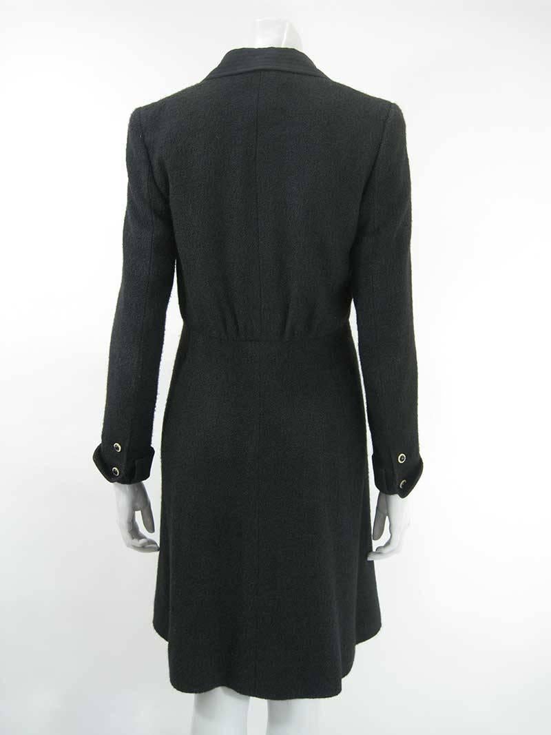 This Chanel coat in 100% silk has quilted lapels and a metal CC logo on one sleeve. 

The coat is tagged a size 38. Made in France.

Measurements:

Shoulders: 14.75