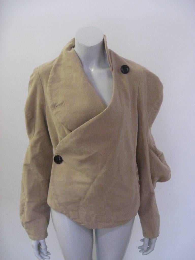 Vivienne Westwood Anglomania jacket in brown cotton. 

The jacket is in excellent pre-owned condition, lightly used.

The jacket is tagged a size US 6.

Measurements:
Shoulders: 16