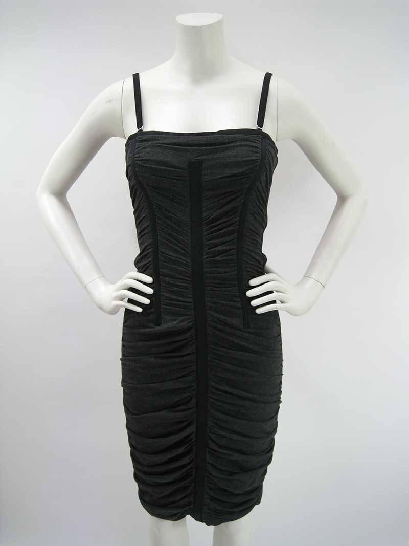 Sexy as ever Dolce & Gabanna bodycon ruched corset dress with boning. 

Black with dark heather grey front panels. 

Adjustable lingerie straps.

Full length back zipper.

Hits at knee.

Fabric consists of viscose, plolymide, elastane. 

Lining