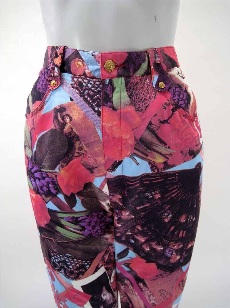 Fabulous photo print Christian Lacroix Bazar straight legged pants.

Vibrant shades of red, purple, pinks and others make up these fun pants.

Pictures of everything from the Beatles, to cats, fans, flowers, goddesses, playing cards, it's all