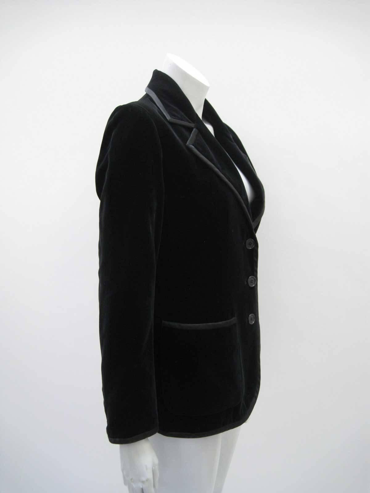 Sumptuous YSL Rive Gauche black velvet blazer.

Soft silk velvet with silk piping.

Fitted shape hits at hip.

Three button closure with three button wrist detail.

One chest pocket and two front patch pockets.

Fully lined.

Tagged size 10.

This