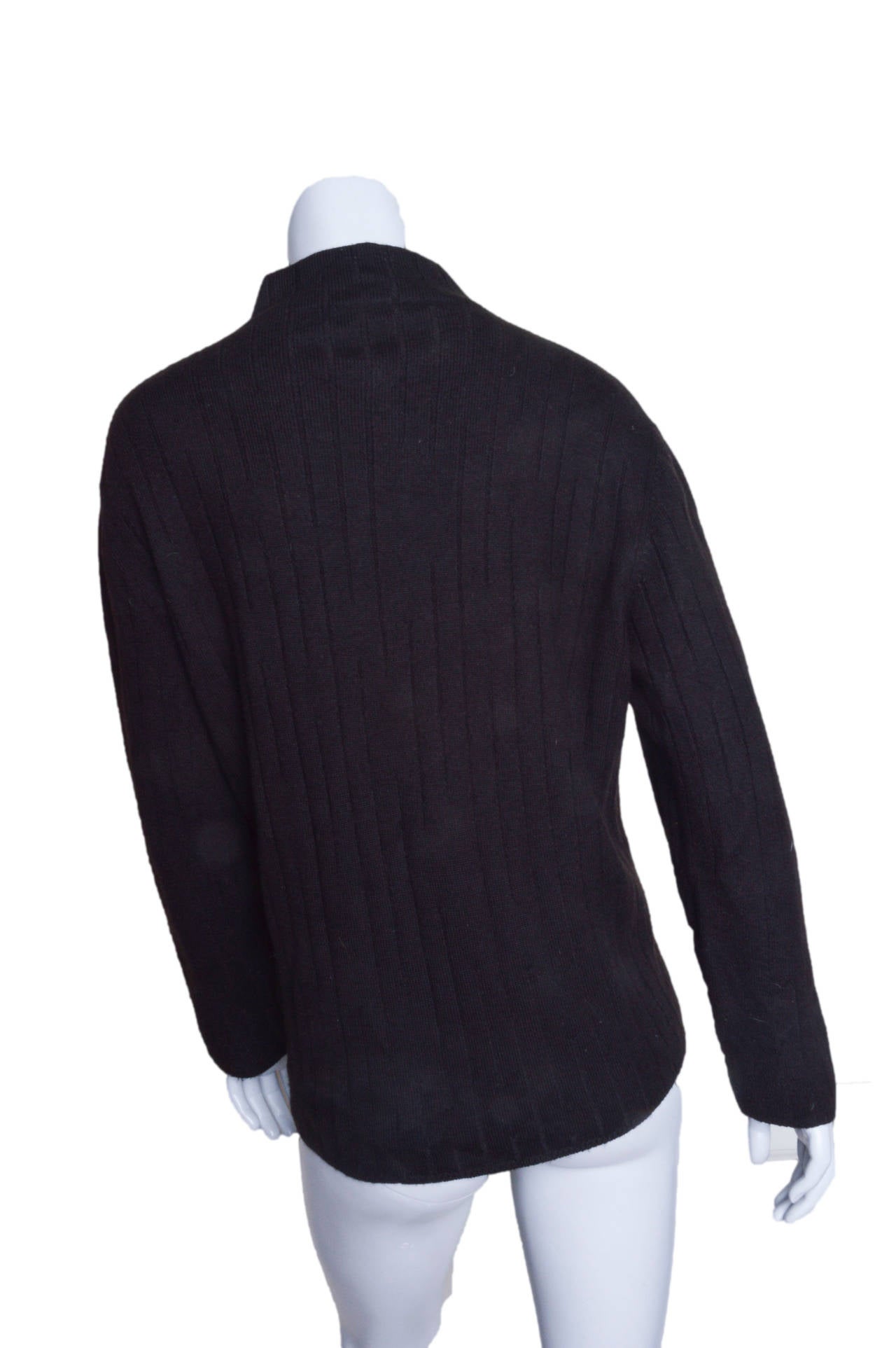 Classic vintage 1960's Hermes sweater.
Dark brown wide rib cashmere and wool blend.
Mock collar.
Easy straight fit.
Tagged a vintage size XL. 
Check measurements below for accurate modern sizing.