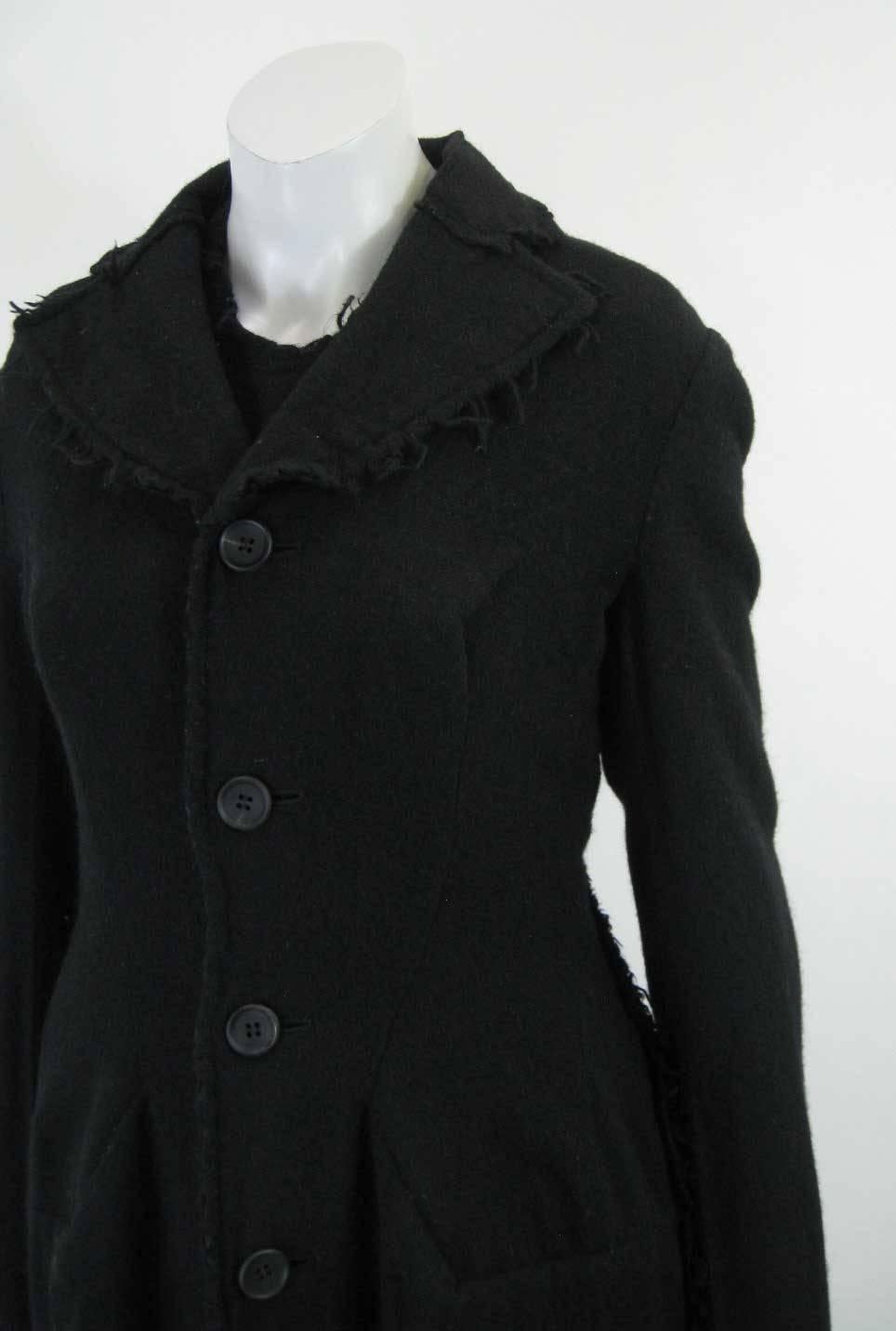 Circa 2003 Junya Watanabe for Comme des Garcons black wool coat and dress.

Fuzzy wool texture with frayed-edge details throughout.

Long coat wis fitted through waist then flares. 

Coat features four button closure, side pockets and back